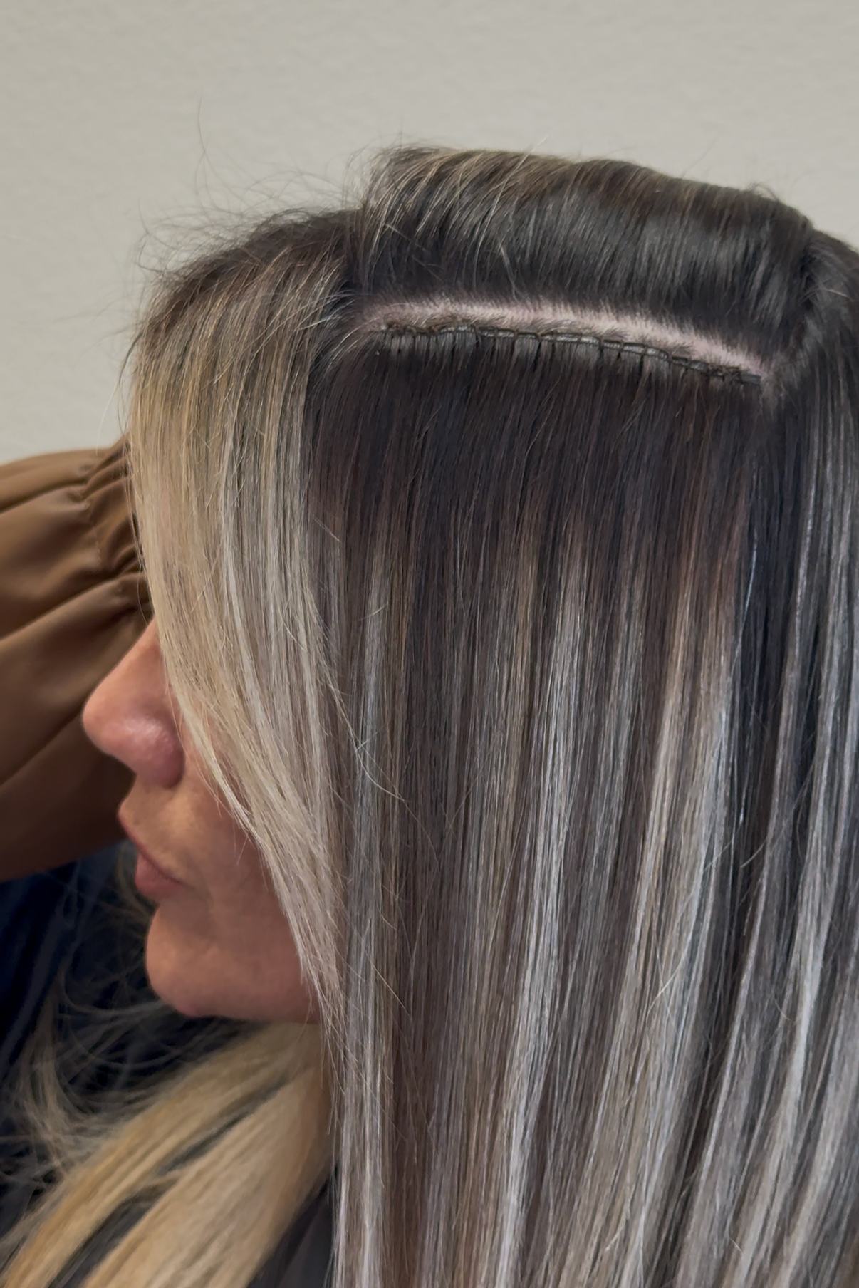 Invisible Bead Extension certified stylist at The Mane Stay Luxury Salon in Clovis, California.