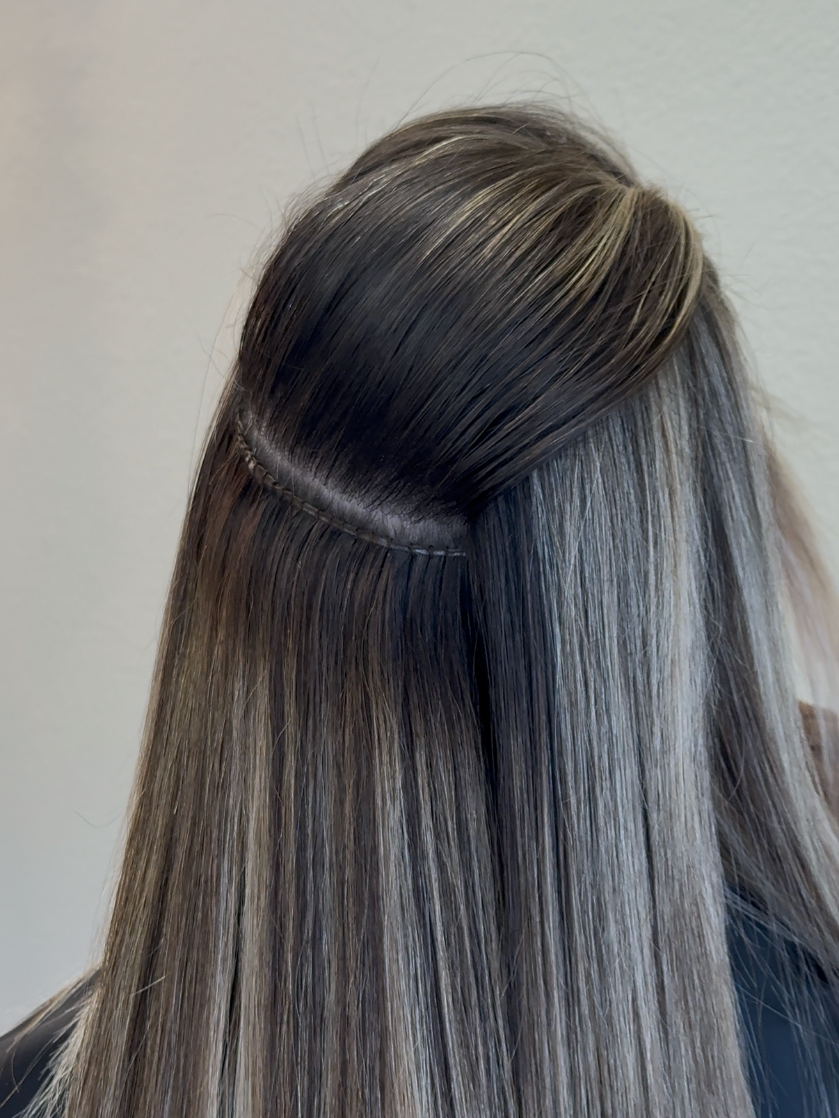 Invisible Bead Extensions showing clean parting, stitching and custom color for my client.