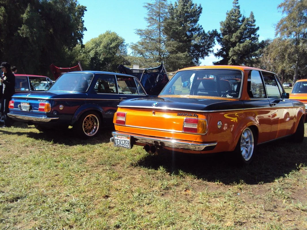 BMW 2002 1976 and 1977 at car show