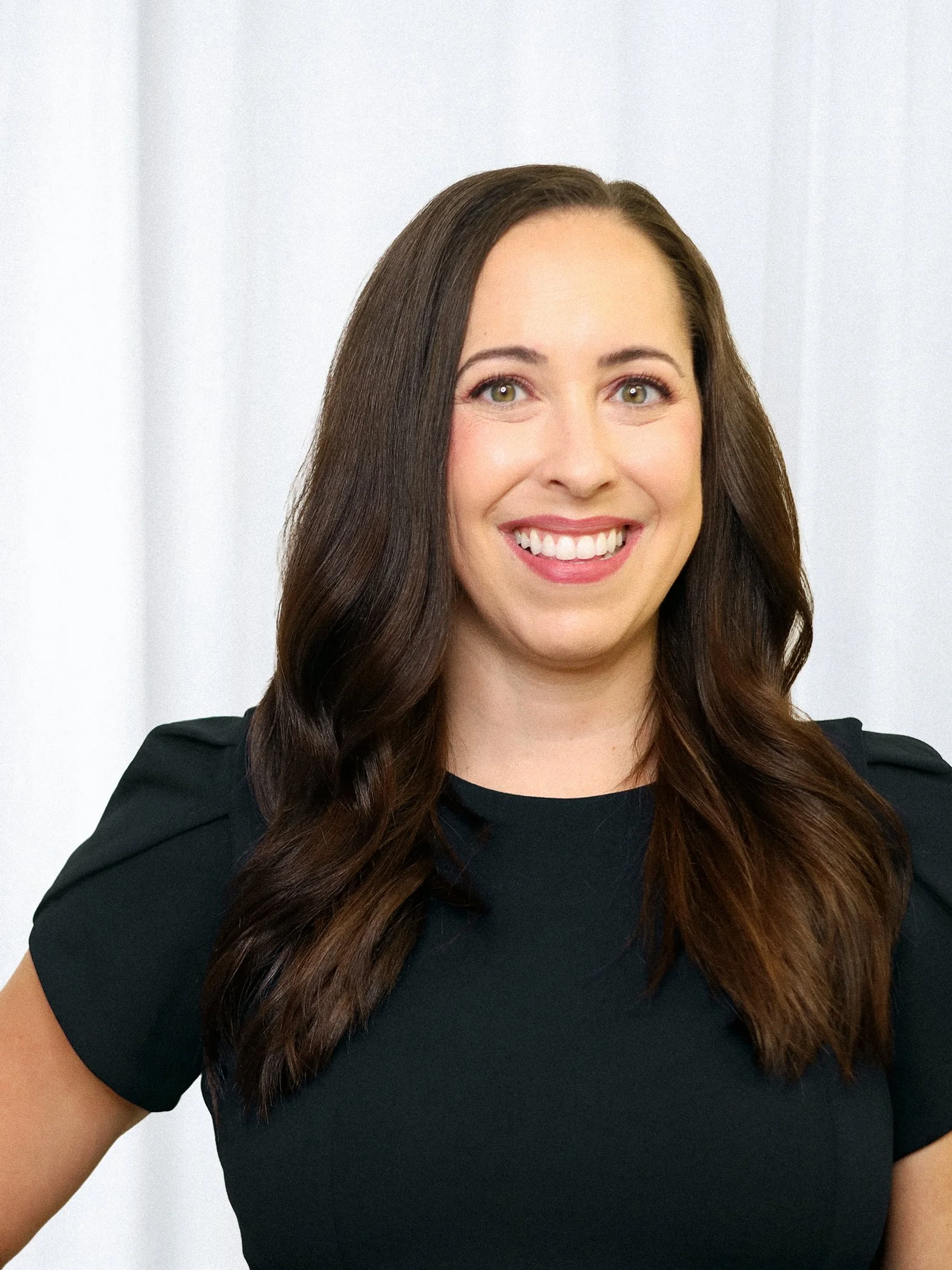 Alexa Krajewski – Plastic Surgery Physician Assistant, smiling at The Plastics Atelier, In Omaha Nebraska