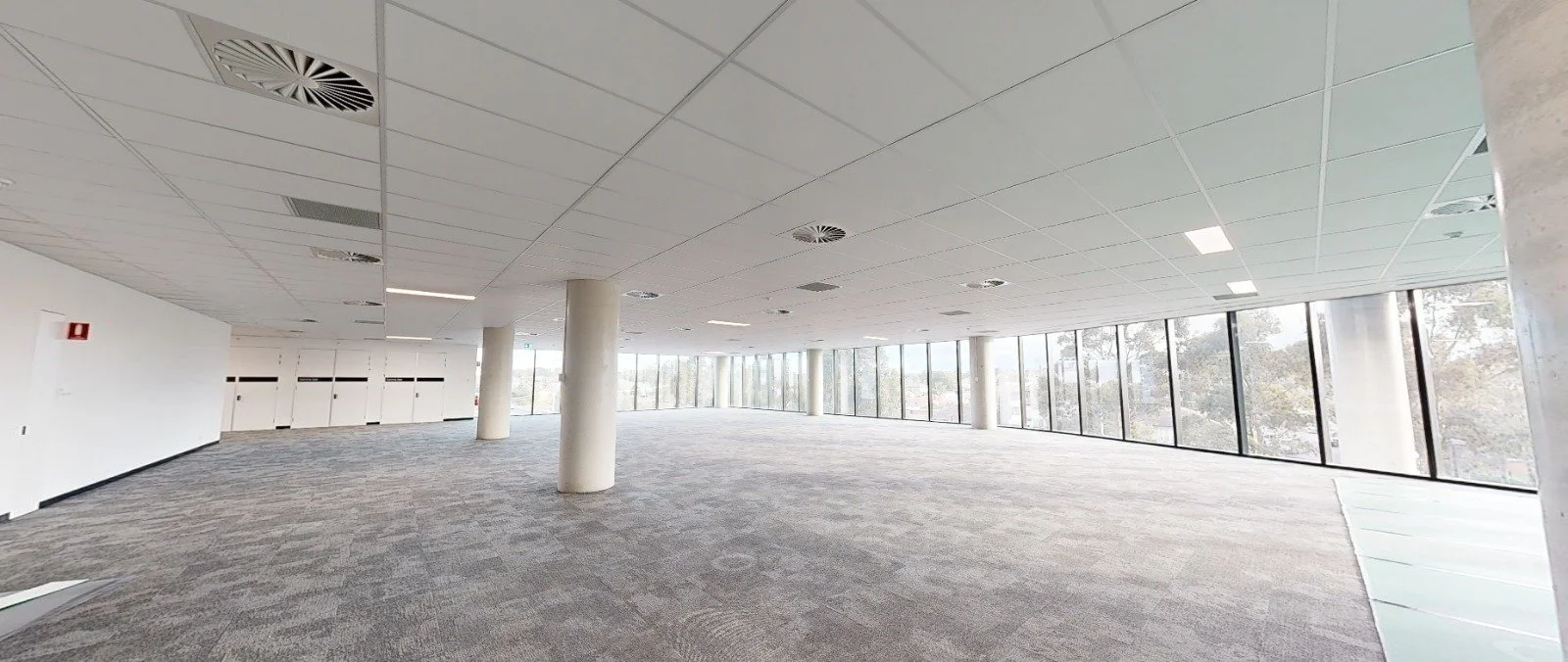 A snapshot of a 3D scan dilapidation survey of an empty office space to capture all spaces including floor, ceiling, ventilation panels, and walls.