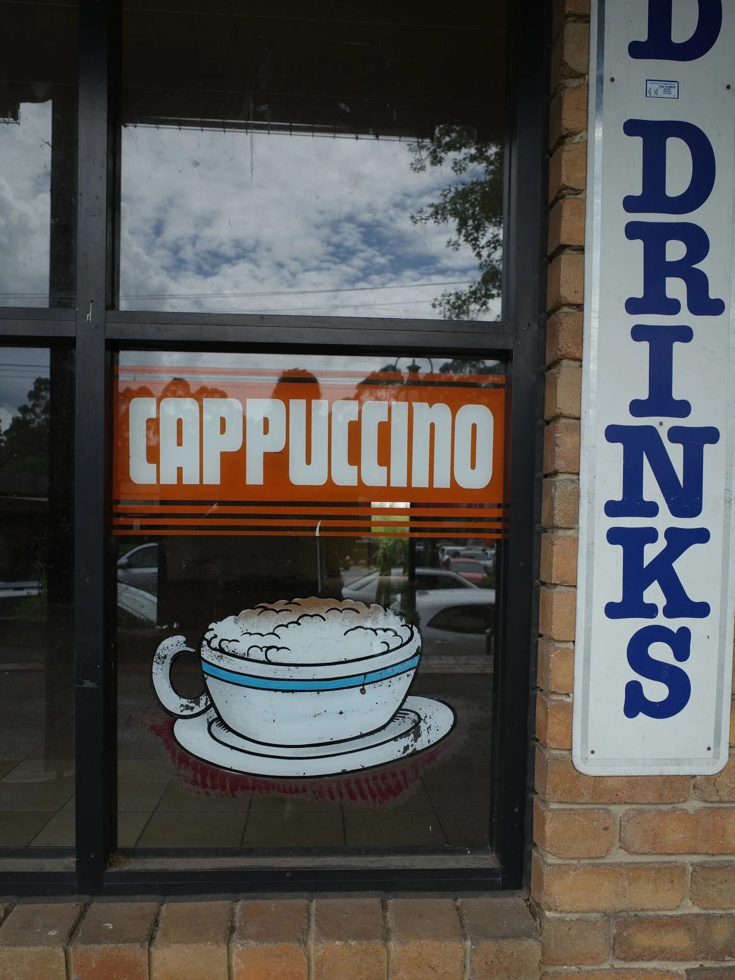 Snapped before bulldozed. I always liked that dated signwriting.