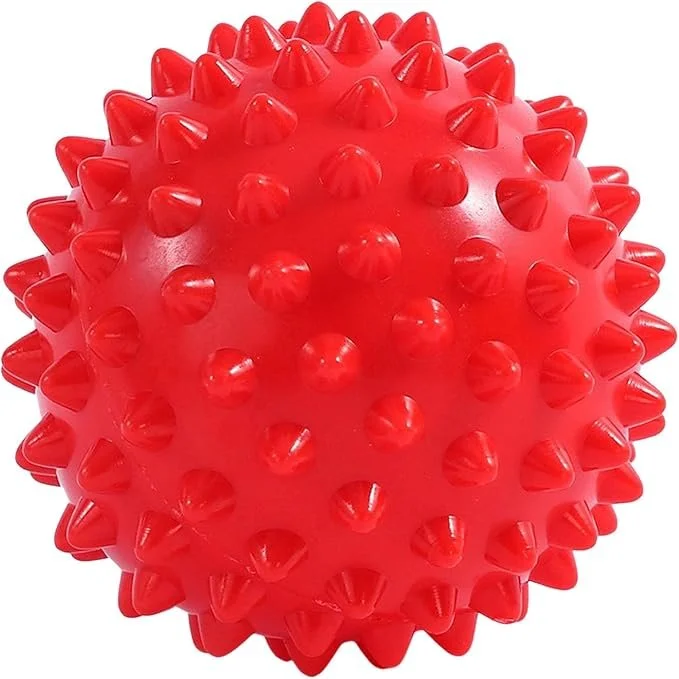 Red trigger ball for self treatment of muscle soreness