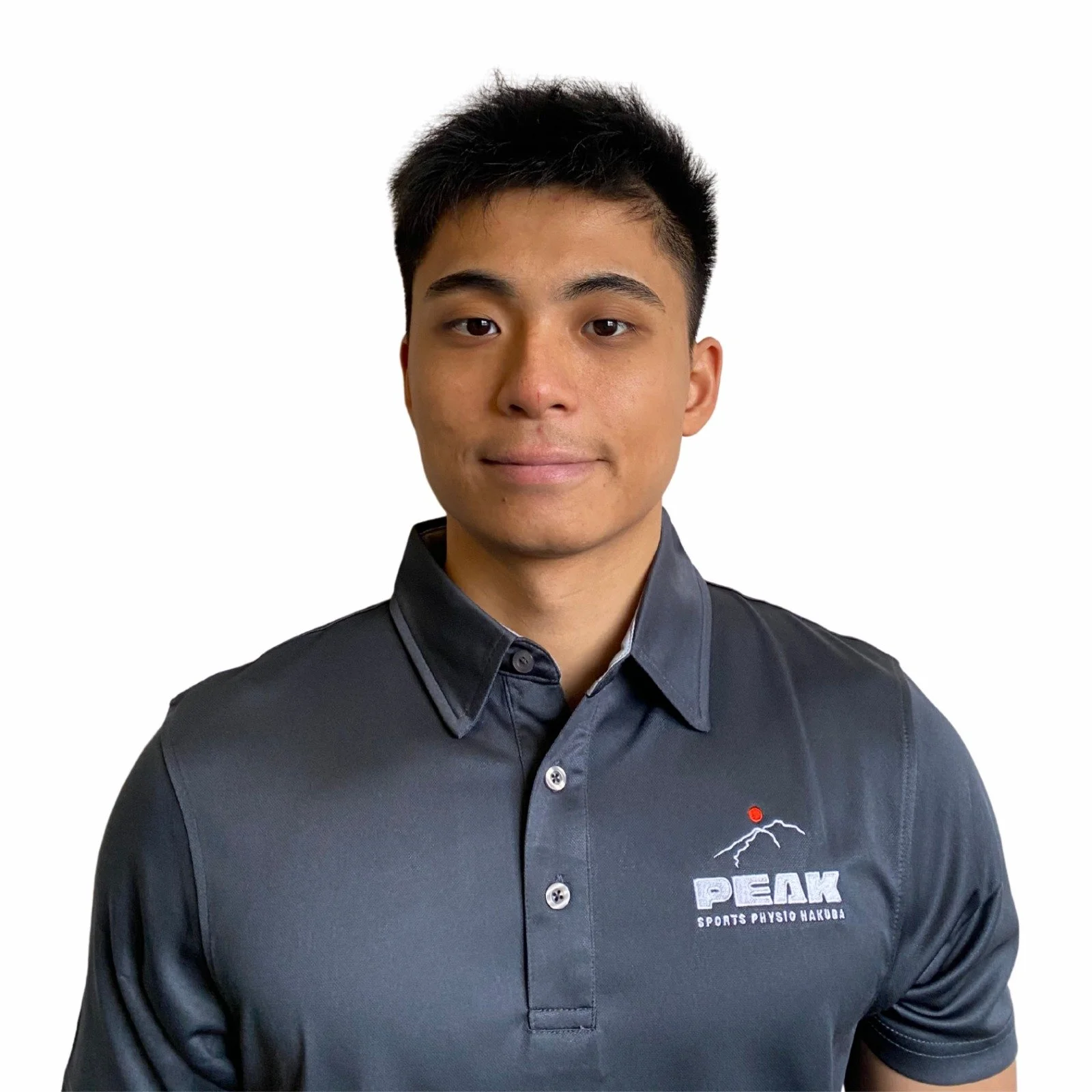 Bobby Wong in his Peak Sports Physio Hakuba uniform