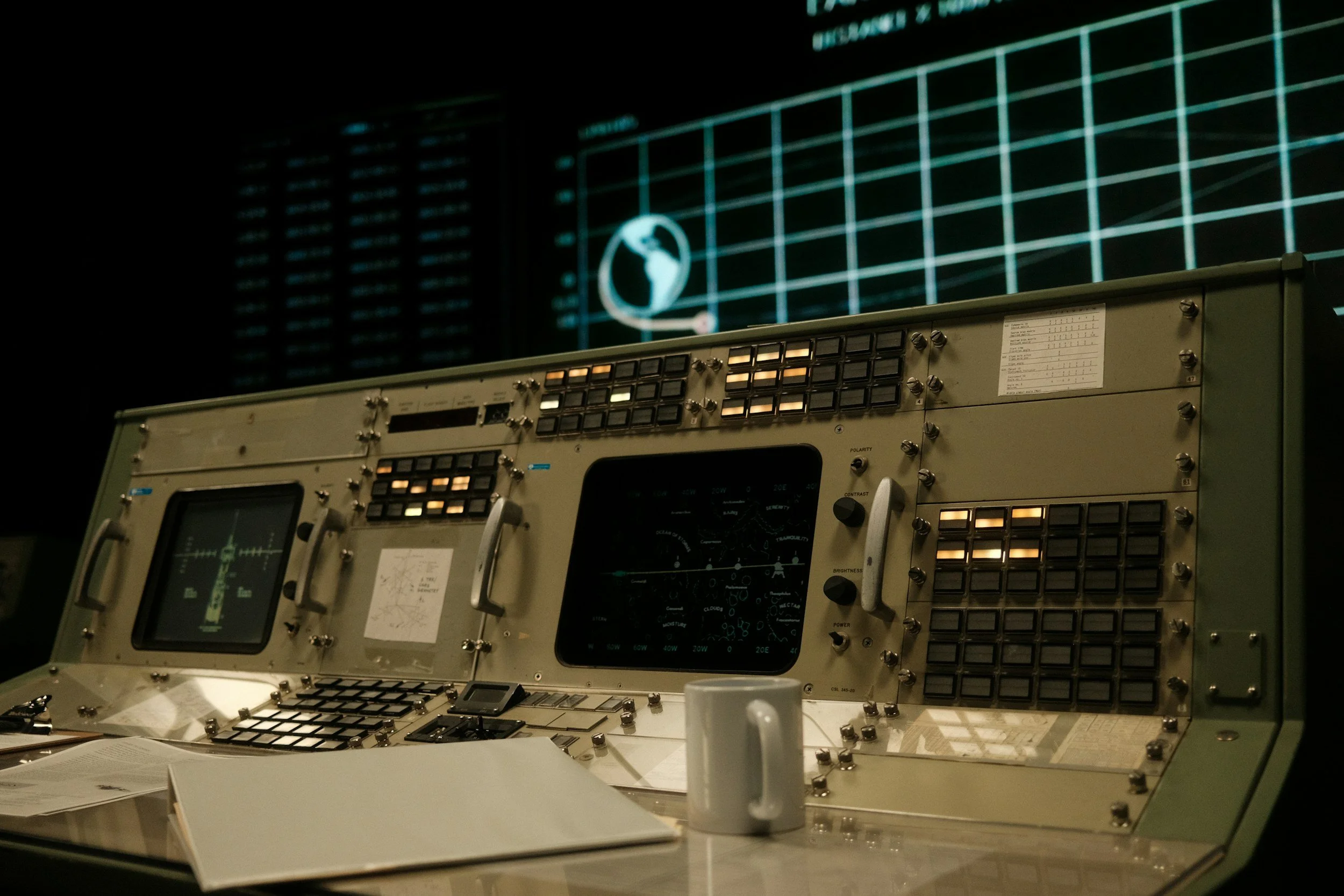 NASA mission control panel with coffee mug - our ideal search ads workspace!