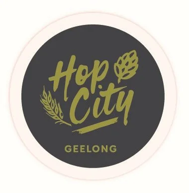 Logo with the text "Hop City" and "GEELONG" below, featuring leaf and wheat graphics.