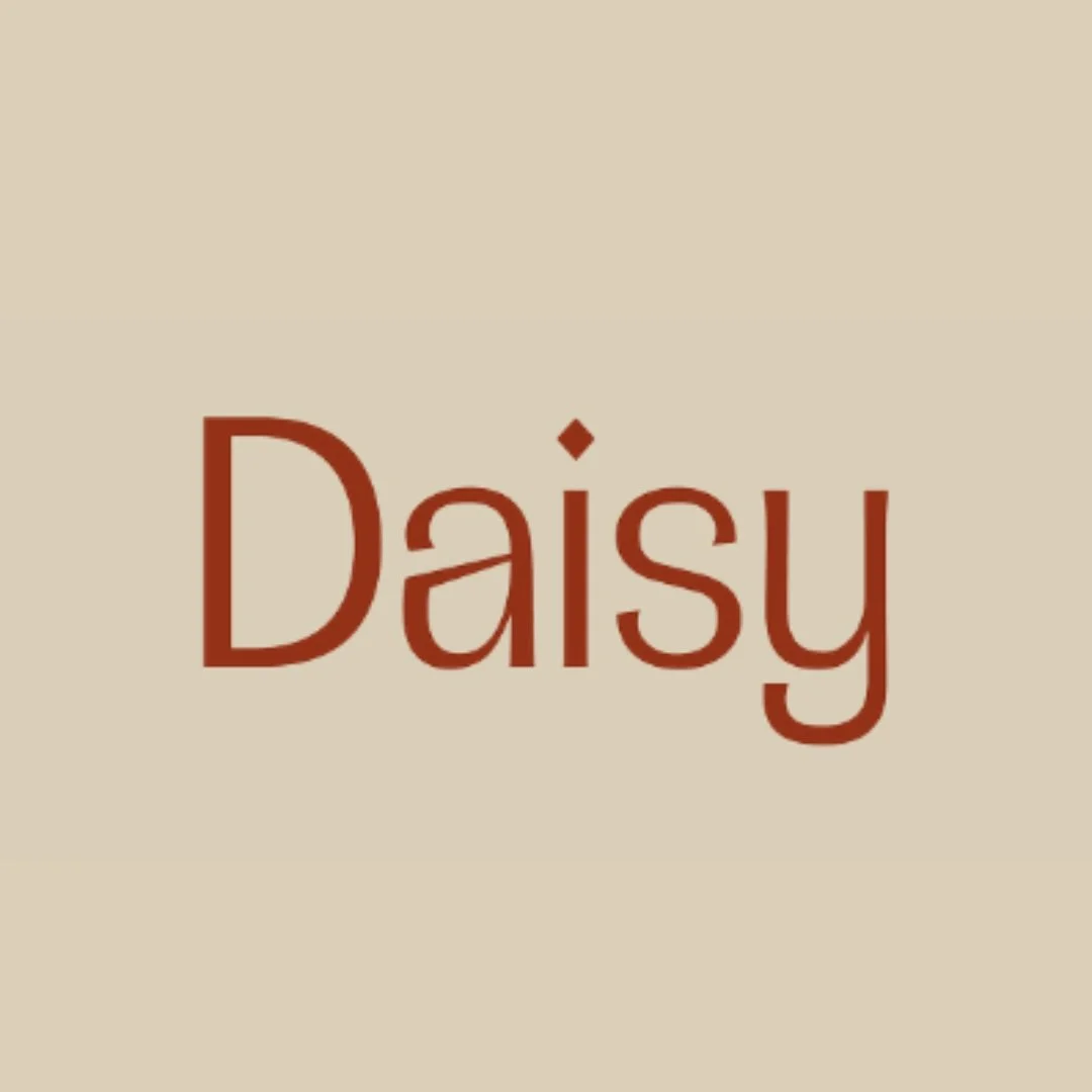 The word 'Daisy' written in large, red, stylized text on a beige background.