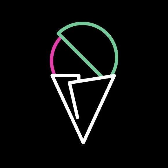 Neon sign of an ice cream cone with a scoop, in pink, green, and white lights on a black background.