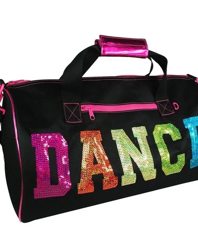 Black dance bag with multicolored sequined letters spelling "DANCE" and pink zipper accents.