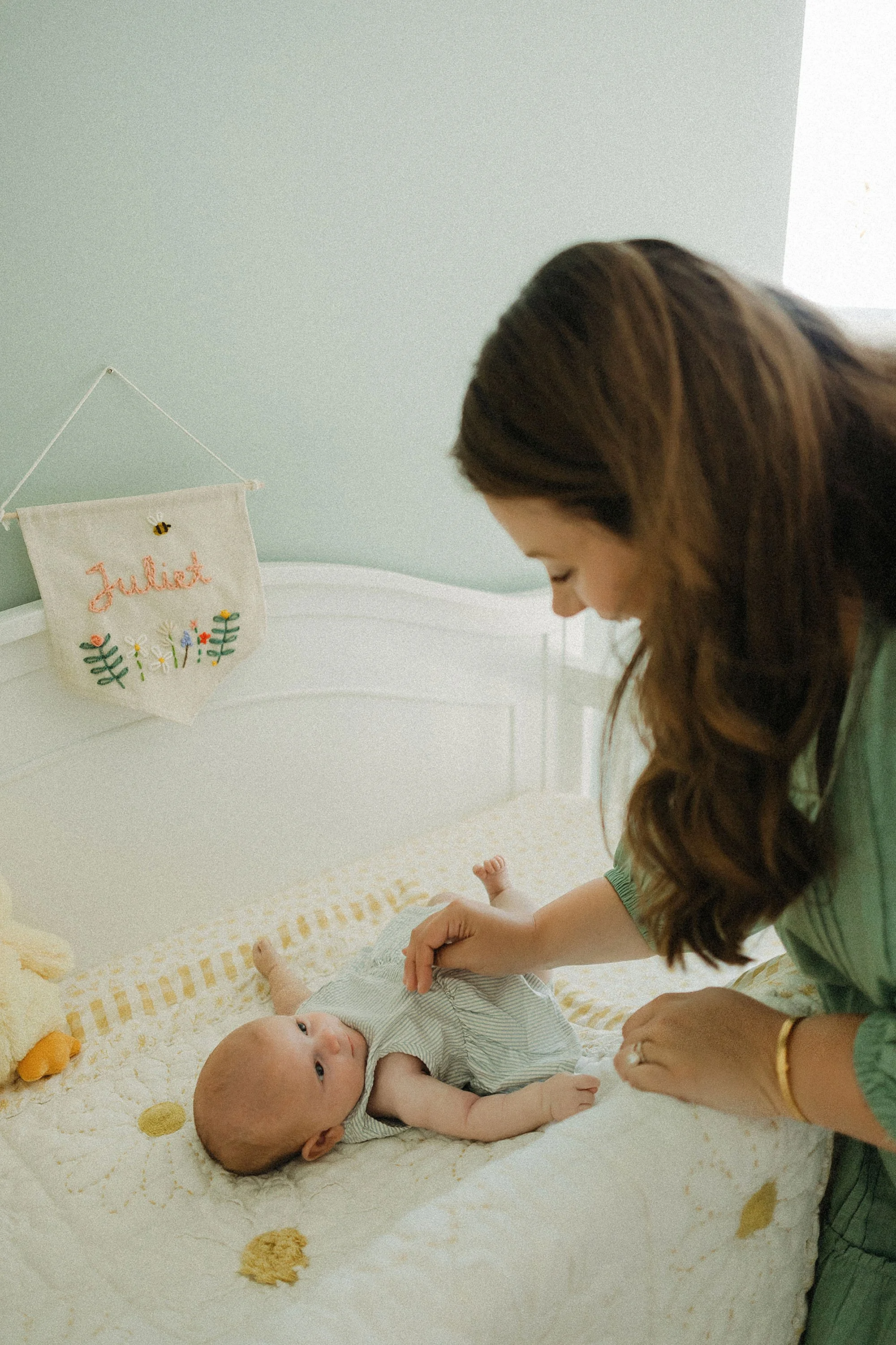  lifestyle newborn photography session showing family connection at home 