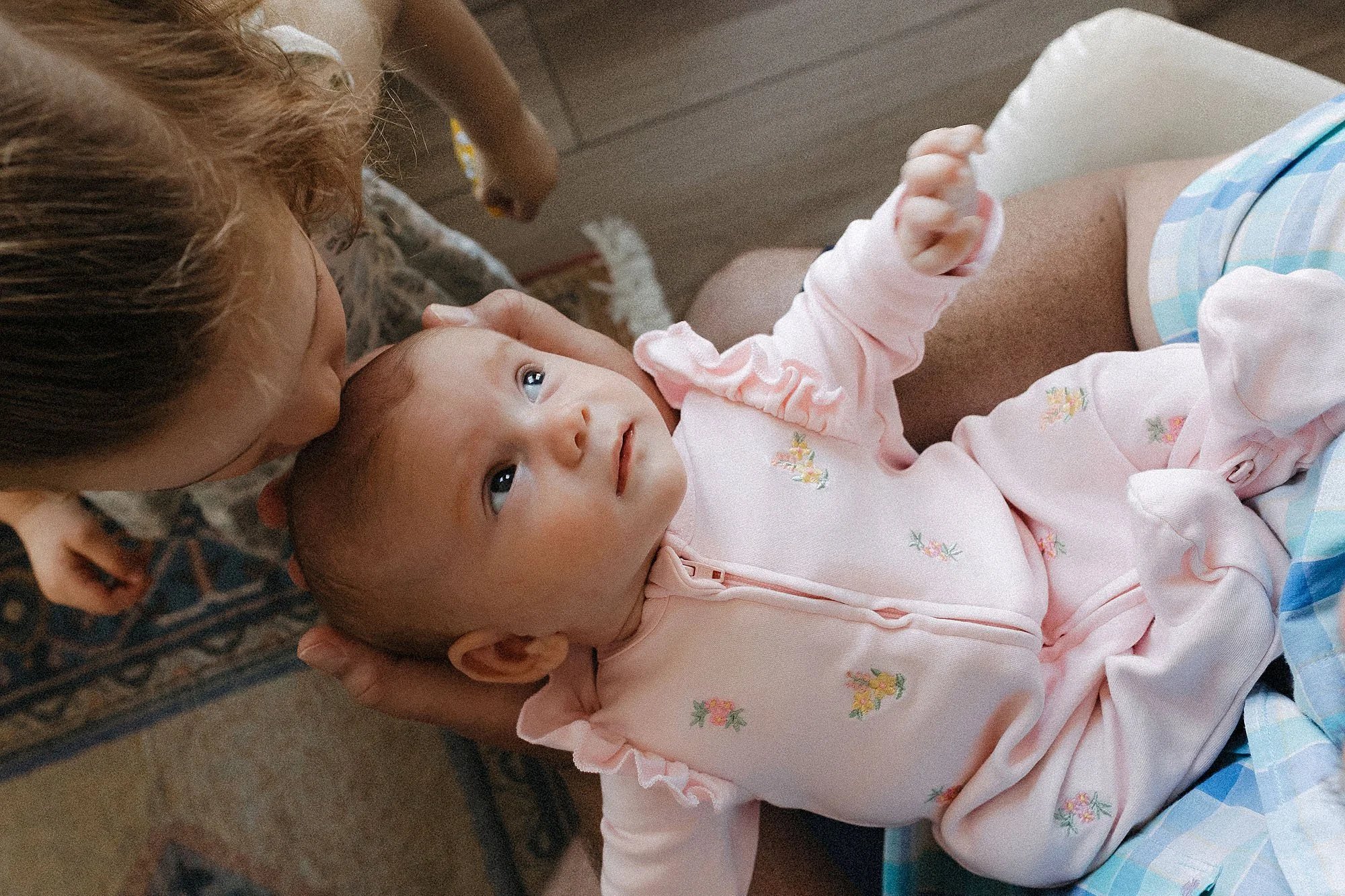 lifestyle newborn photography session captured by Lauren Lewis in Indiana