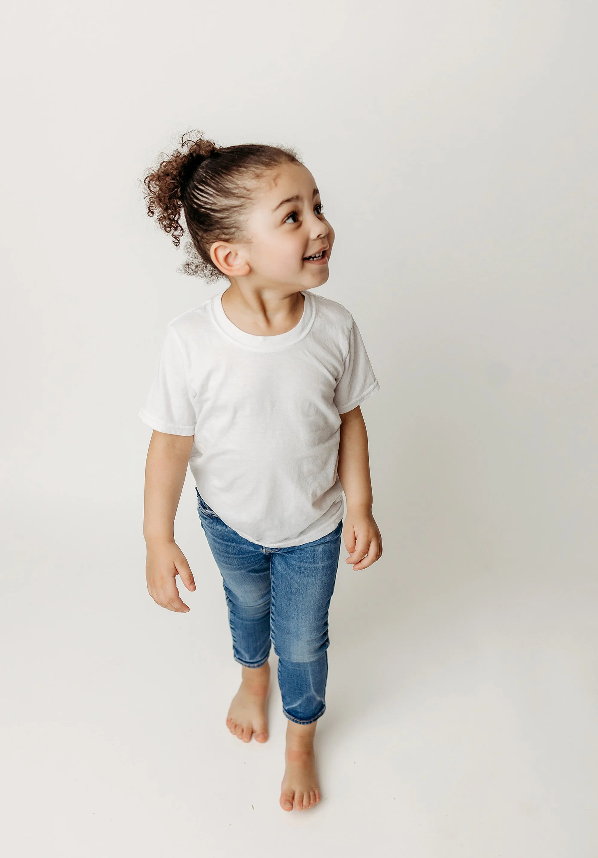 Clean and timeless personality portrait showcasing a child’s unique expression