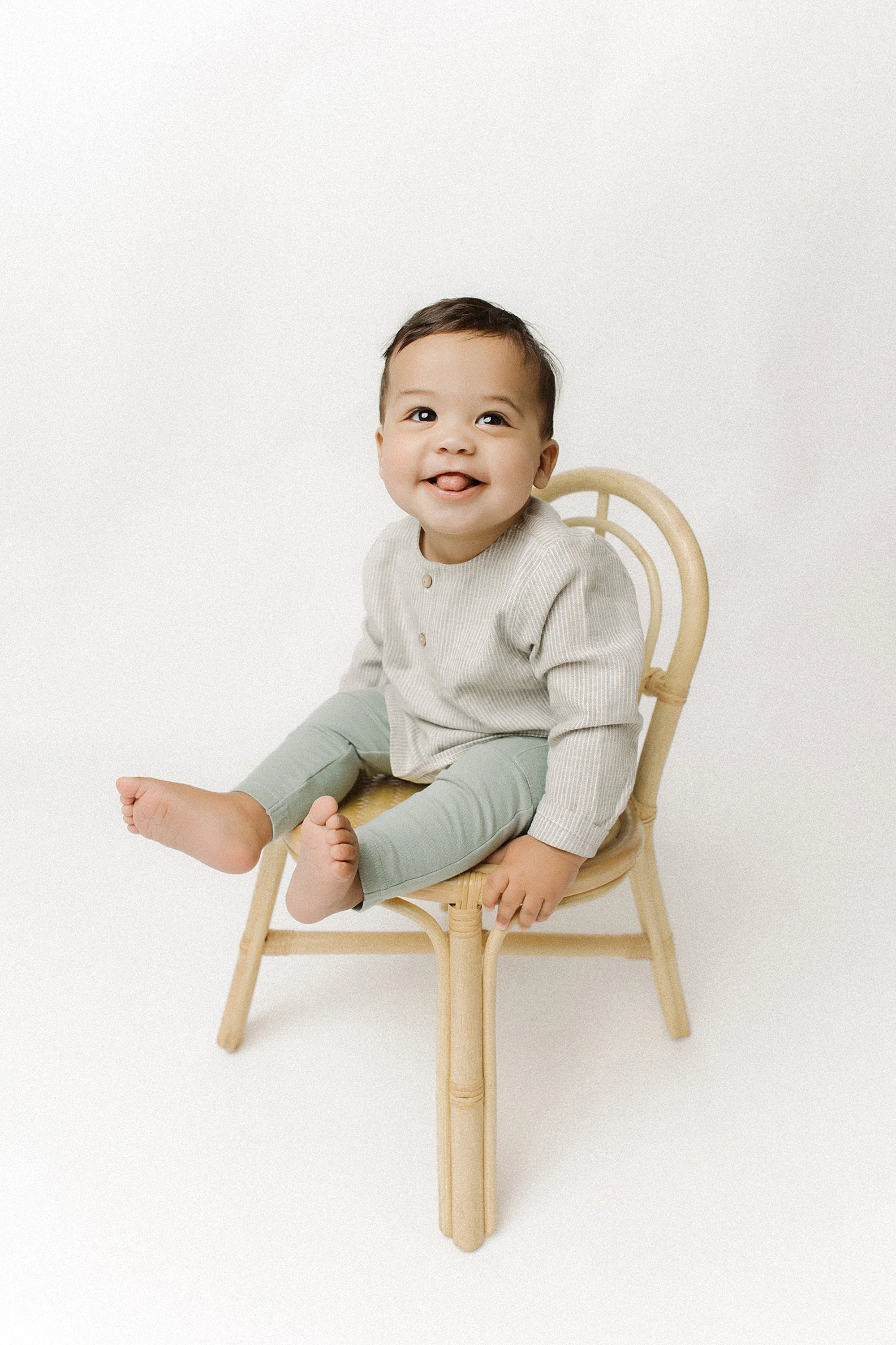 Child making a silly face during a kid focused personality portrait session with no pressure to perform