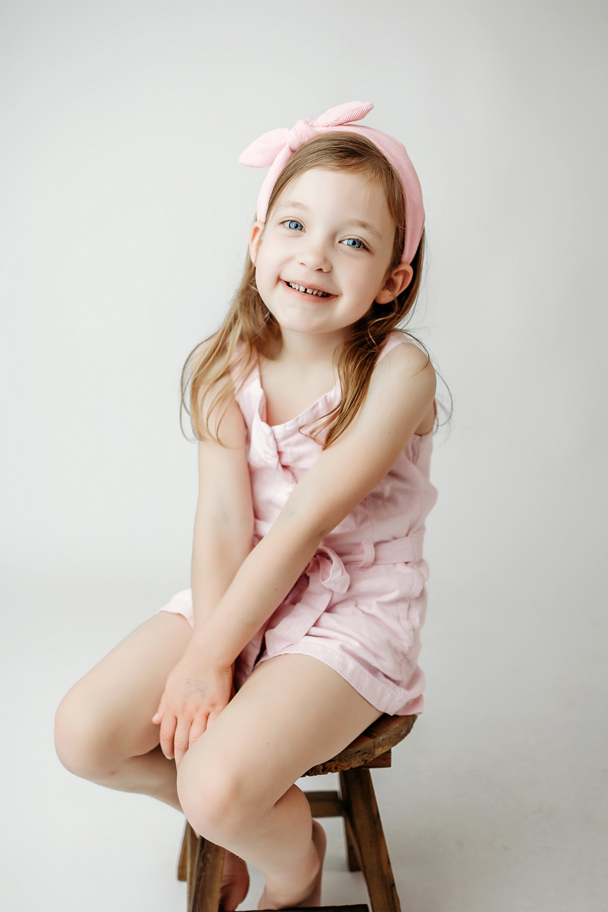 Natural expression captured during a personality portrait session for children in Sheridan Indiana