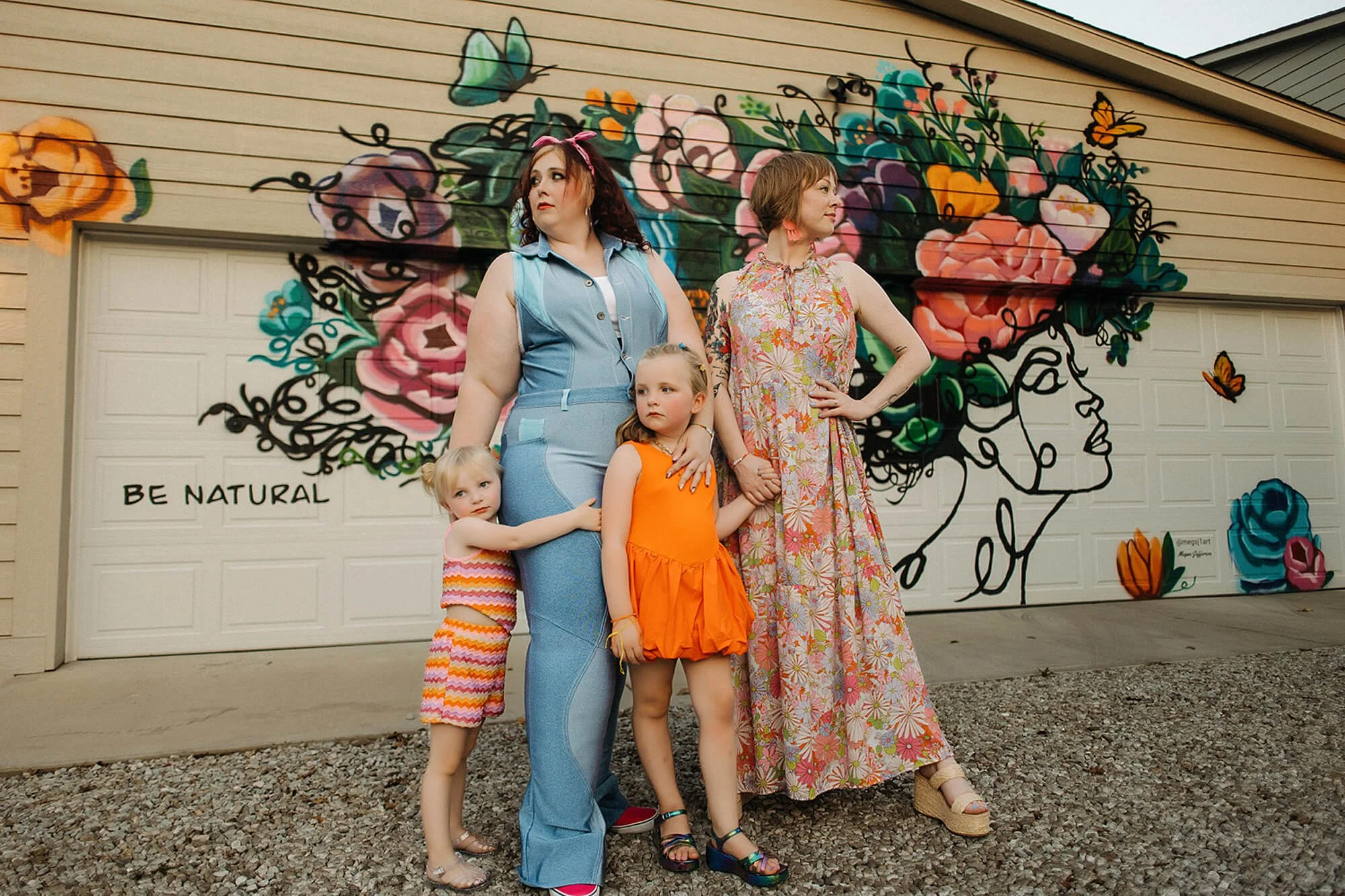 editorial image with women in the family, mom, aunt, and two sisters in Flower Alley, Indianapolis during their unique family photo session in Indianapolis