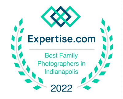 Logo of Expertise.com with the text 'Best Family Photographers in Indianapolis 2022' surrounding the logo in a laurel design.