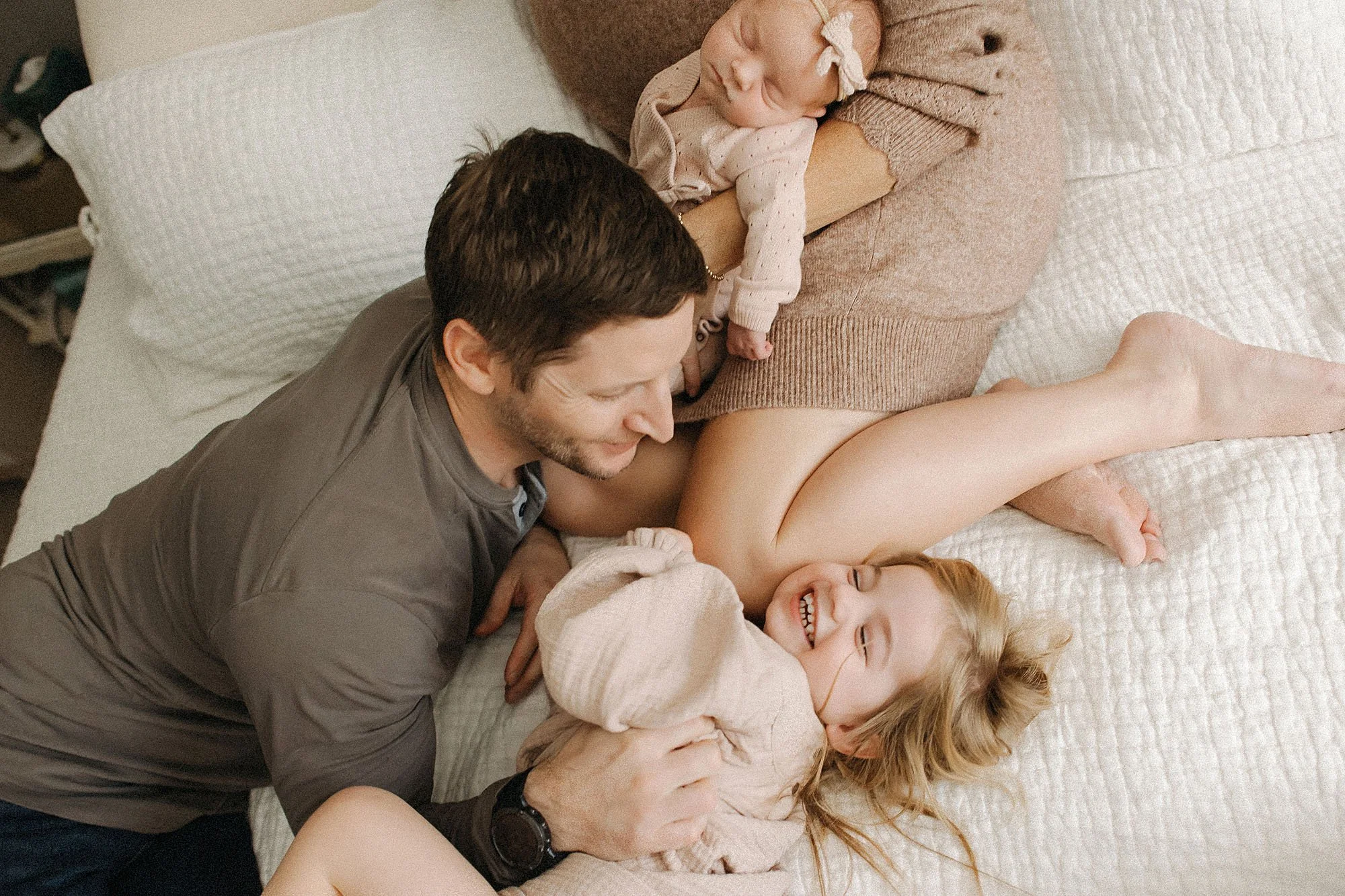 family connection moment during newborn lifestyle photography in Indianapolis