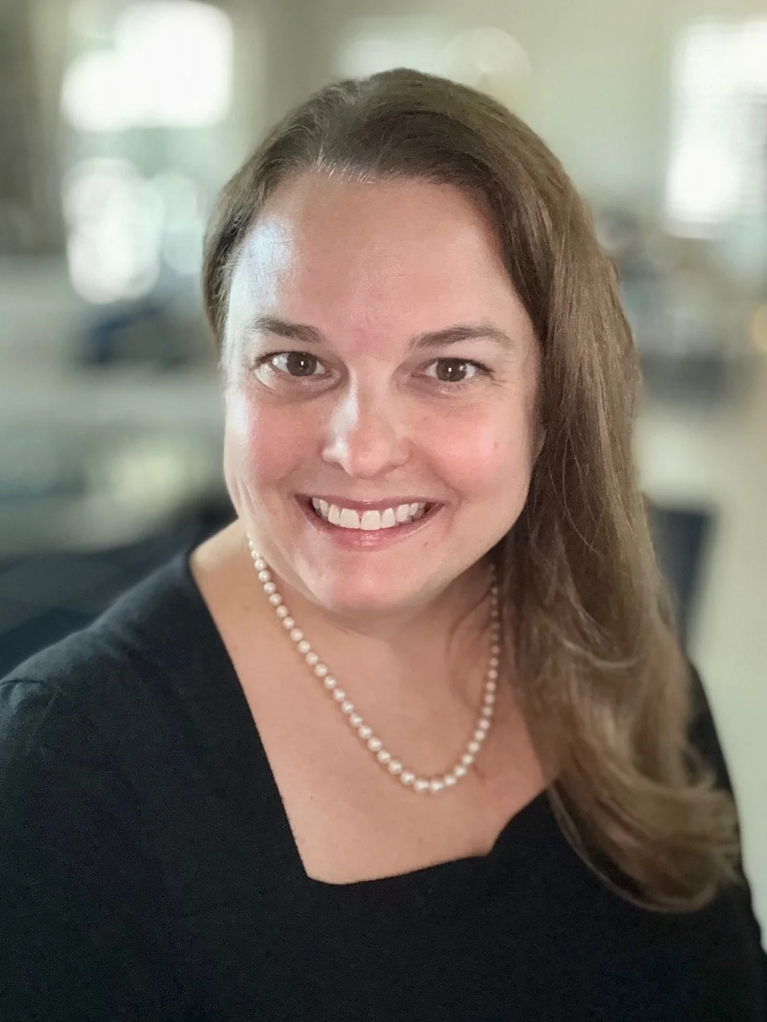 Image of Jaclyn Toale, owner and founder of Comforting Currents based on her love of animals and committment to a mor gentle and pollution free alternative to fire-based pet cremation.