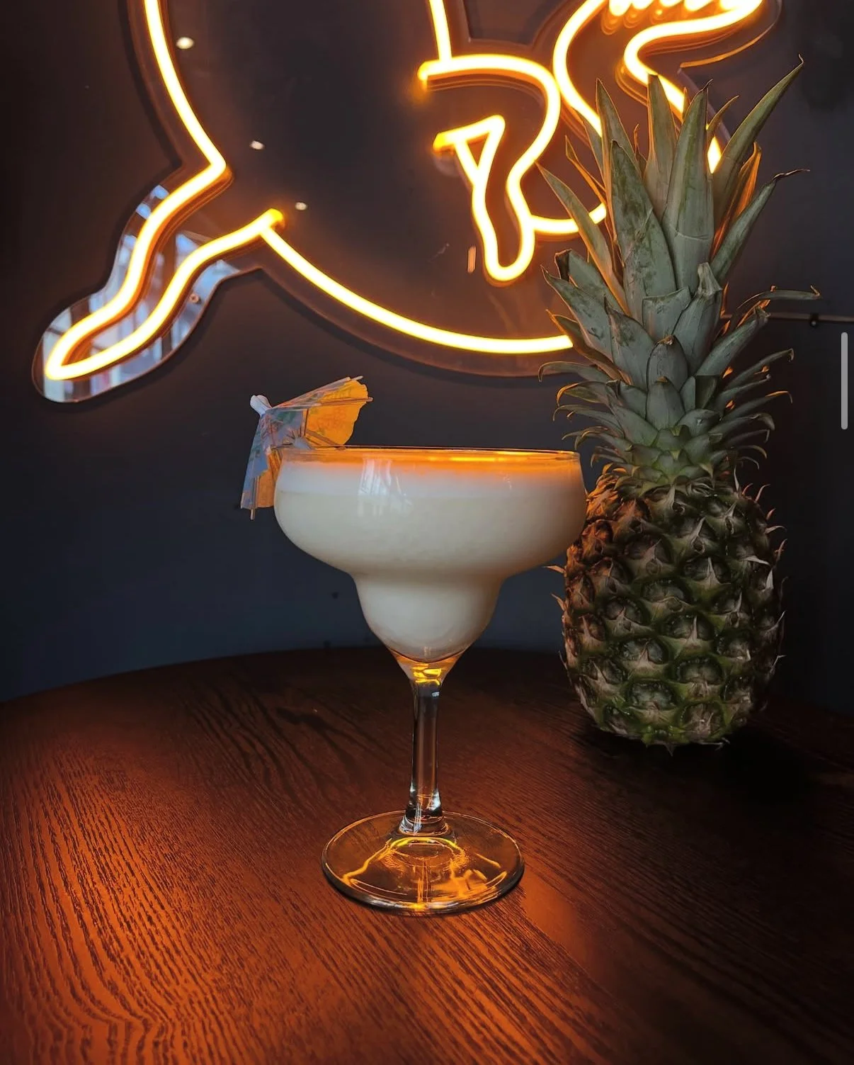 A martini cocktail with olives