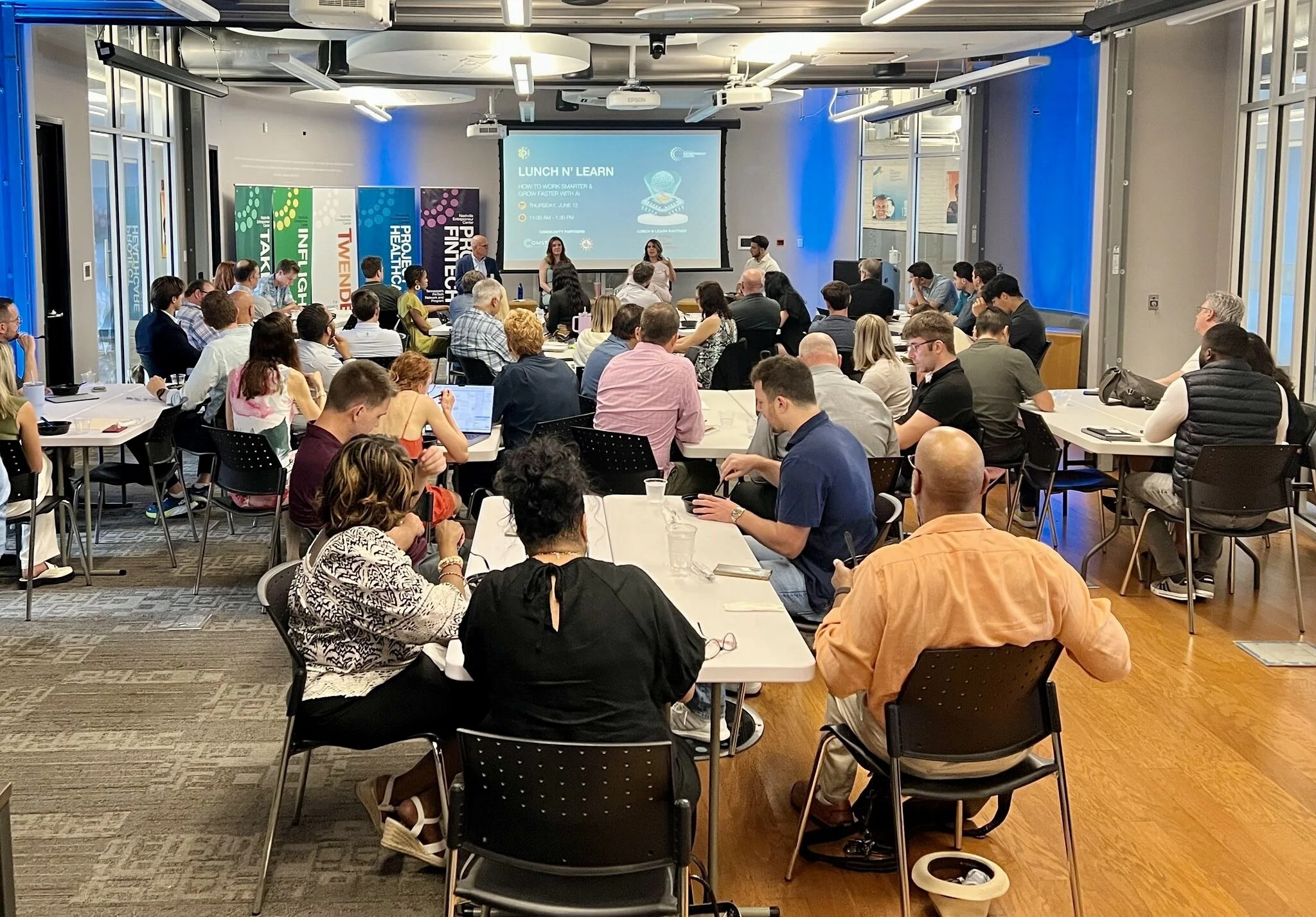 Business audience attending an AI workshop