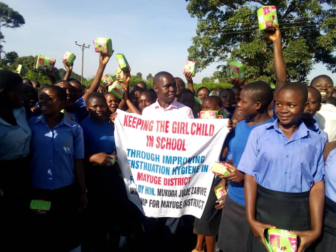 GIVING OUT SANITARY PADS.jpg (2).jpg