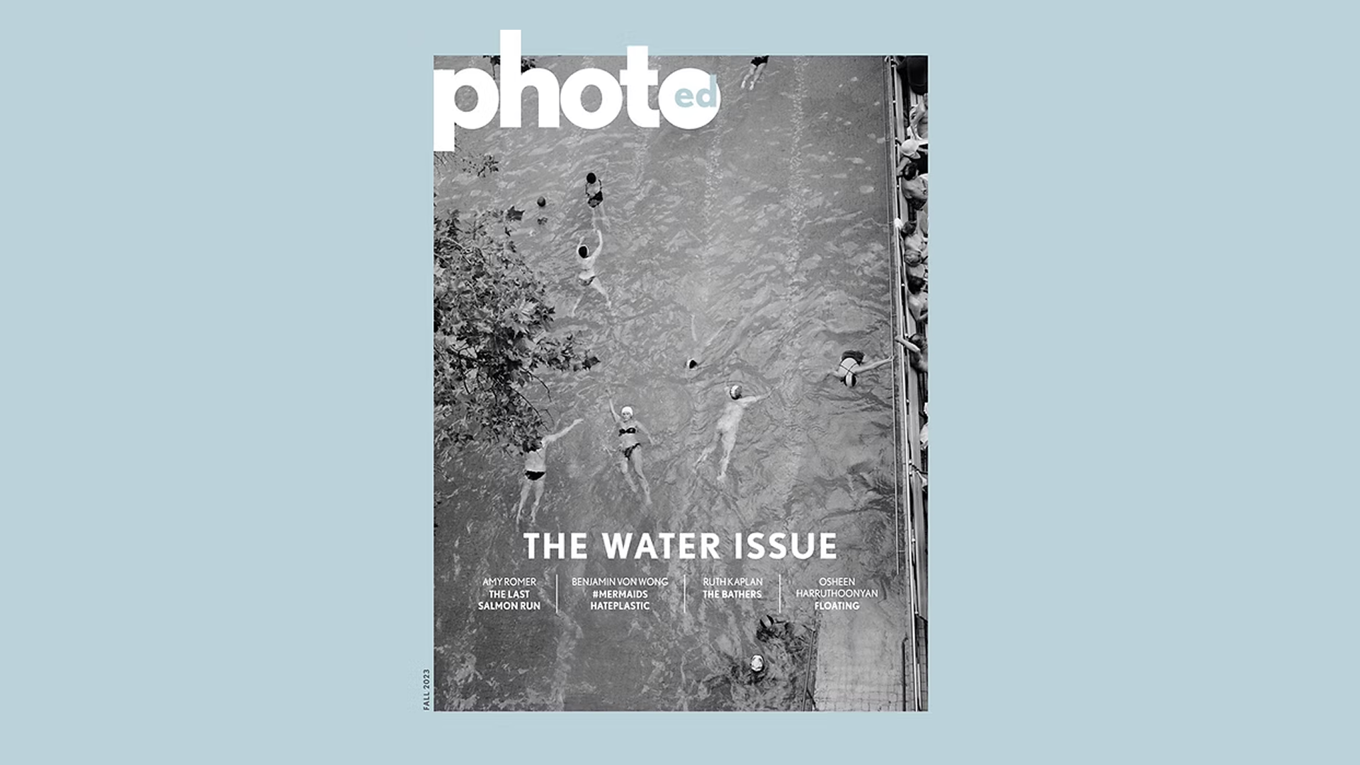Cover of a magazine titled 'photo ed' with a black-and-white aerial photo of a swimming pool filled with people swimming and playing, some standing on the pool's edge, people wearing swimsuits and swim caps, and trees visible at the top left corner.