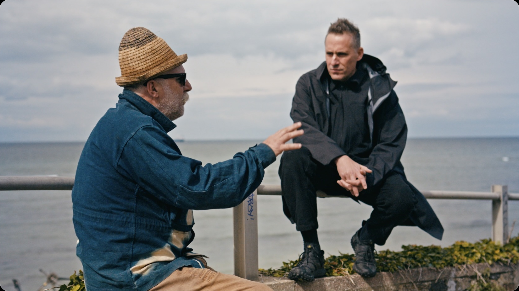 BISON on-location podcast shoot, conversation on a seafront wall, Endless Vital Activity series