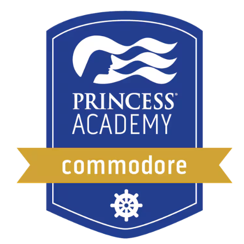 Princess Academy badge with a stylized profile of a girl with flowing hair, the text 'PRINCESS ACADEMY,' and a gold banner with the word 'commodore' below. This is a Princess Cruises certification indicating  the highest level of certification.