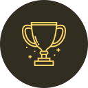 Gold trophy cup with stars around it on a dark background.