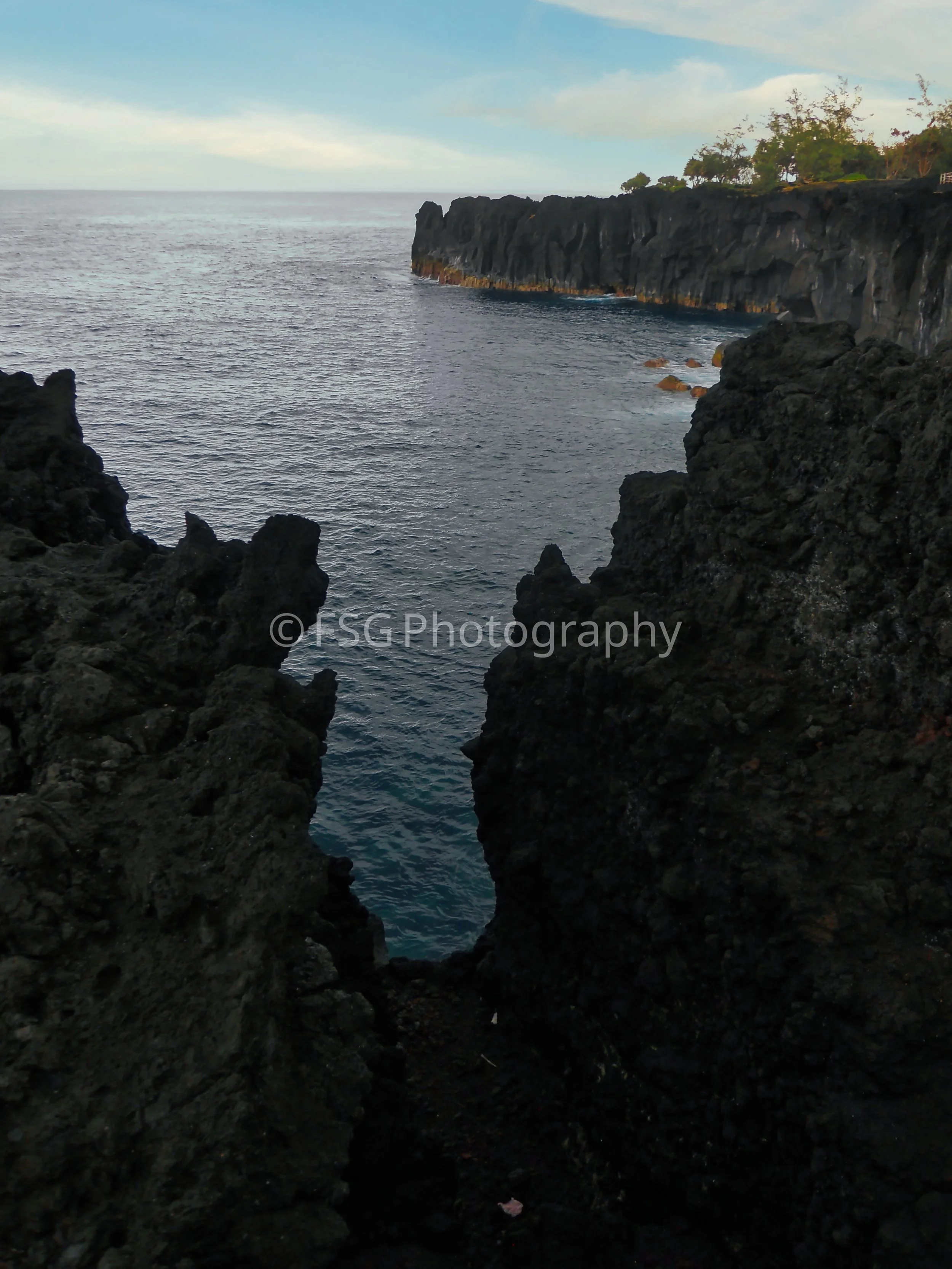 Chasm and Shore

A layered coastal landscape from Mauritius. The start framing highlights the geometric contrast between rugged, ancient volcanic landforms and the fluid, colourful vastness of the ocean.