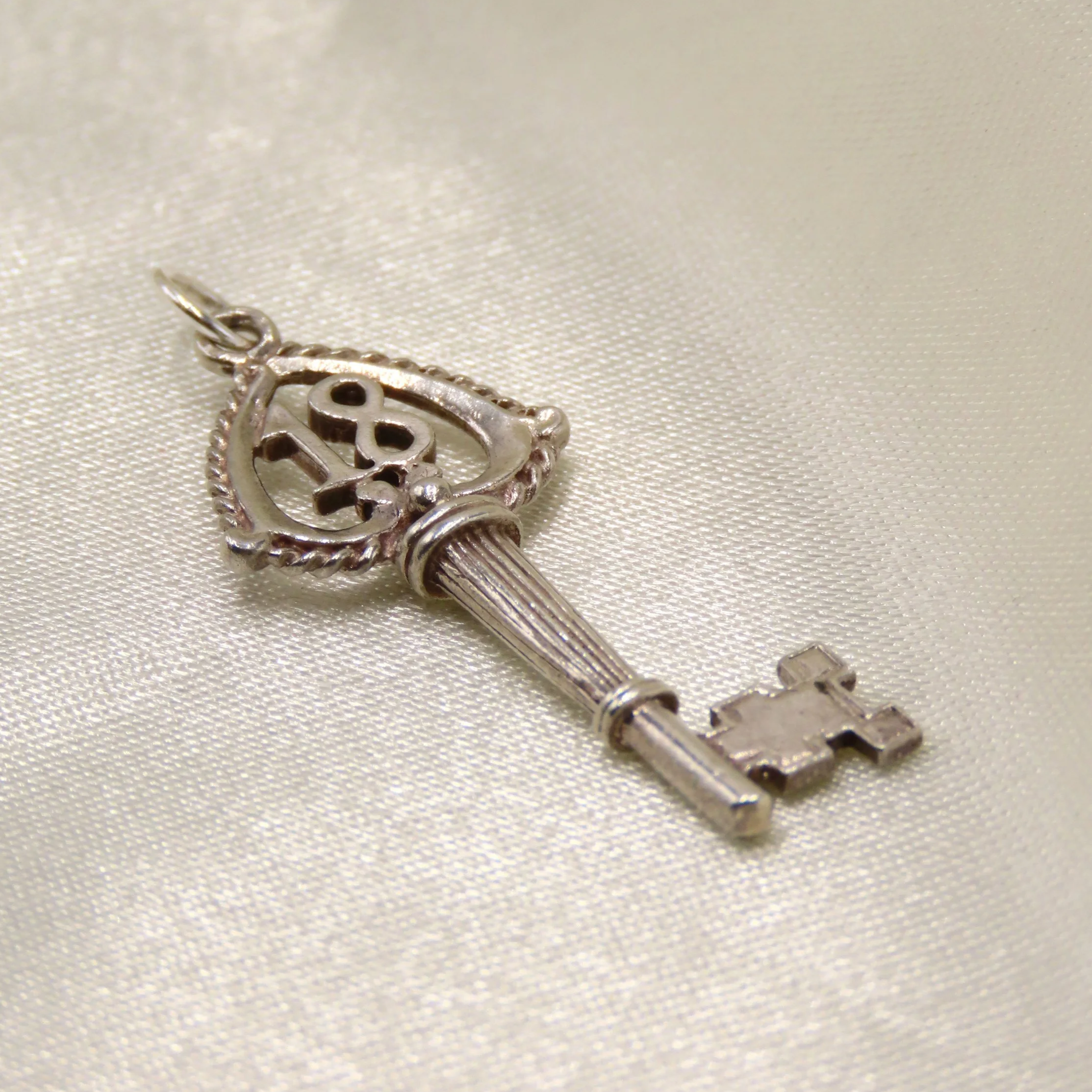 Silver 18 Key Charm