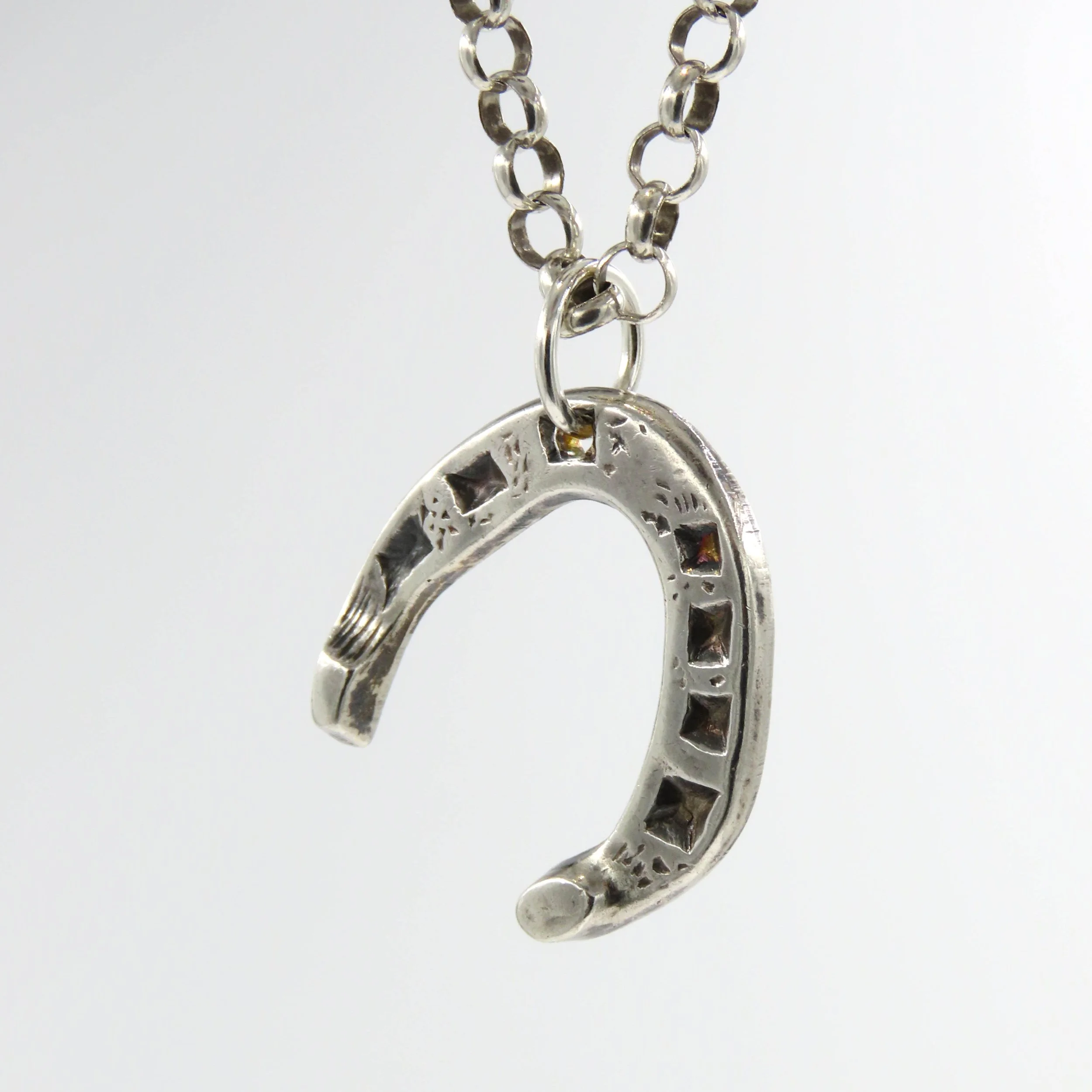 1932 Sterling Silver Horseshoe Pendant