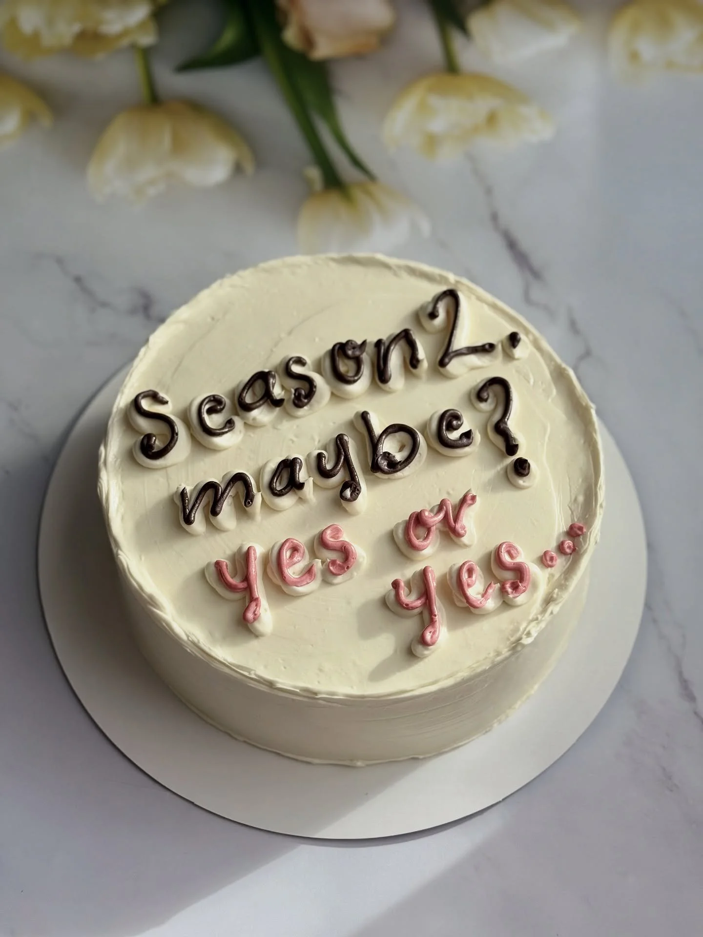 I never usually wonder about cake orders, but these ones are intriguing! 😅 
Here are some guesses: 
Option 1: Friends vibes, maybe a proposal? 
Option 2: Couple's life ahead? 
Option 3: Engagement alert!