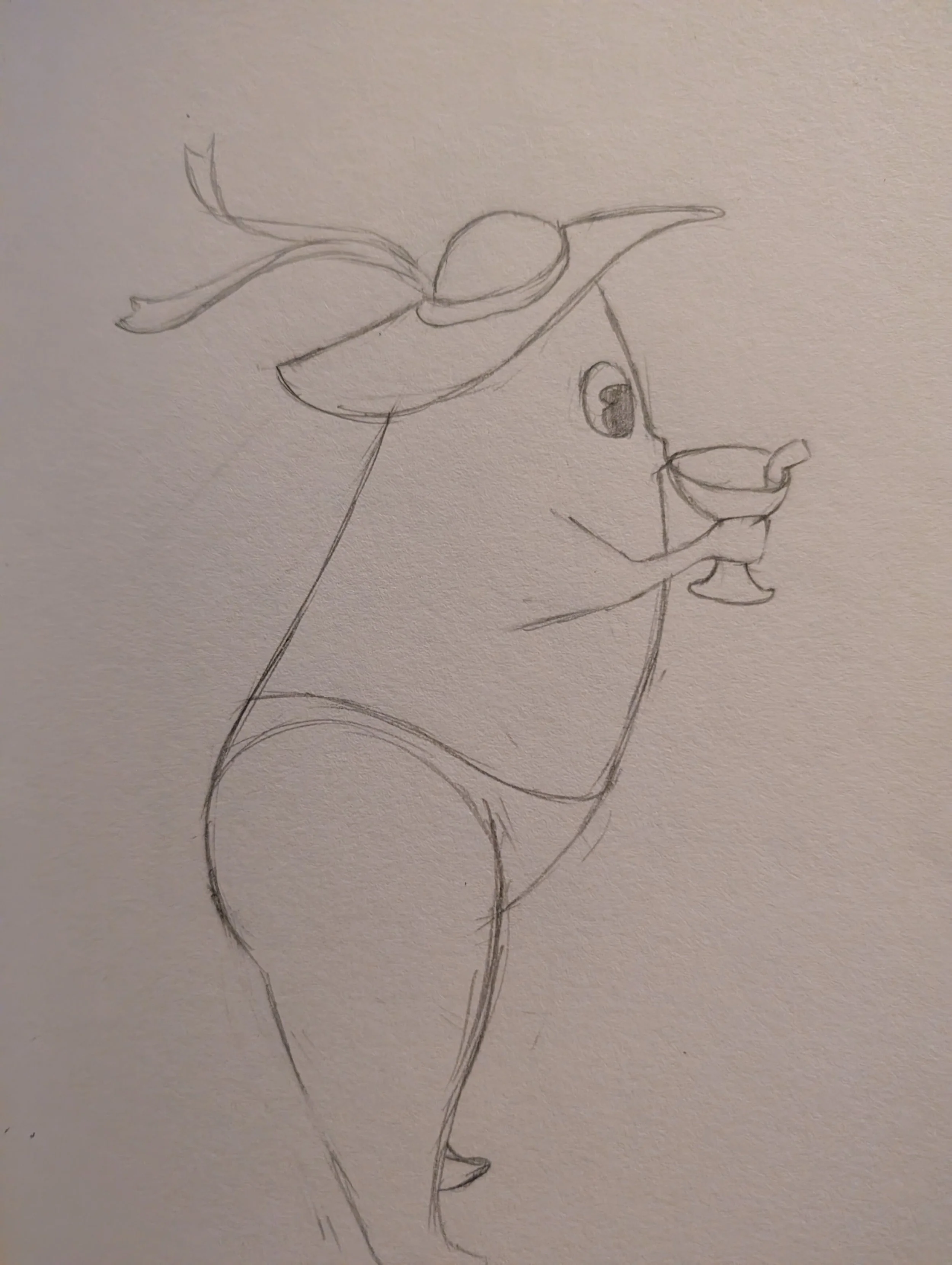 01/15/2026 Mango boy and his iconic vacation hat.