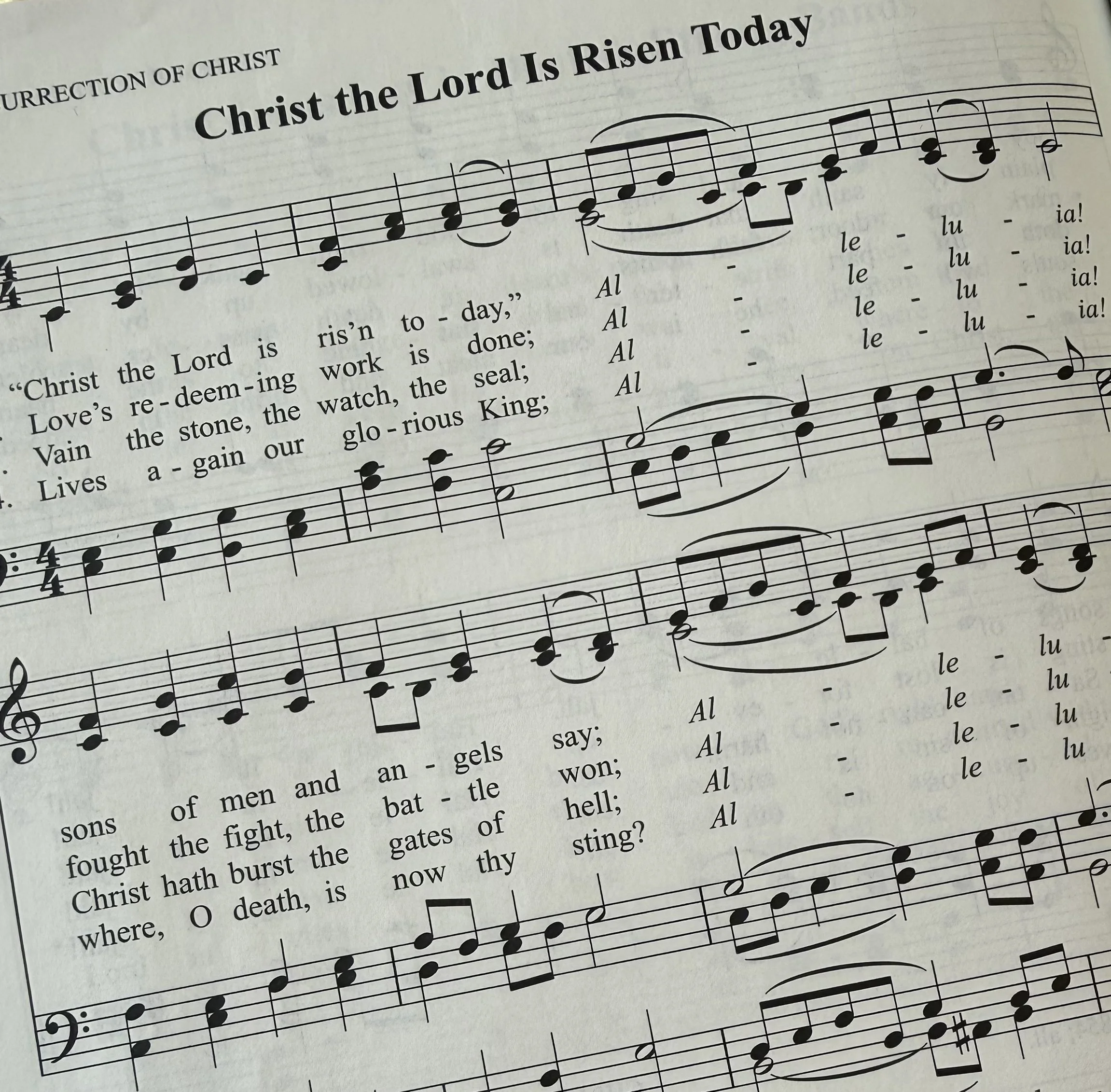 Sheet music for the hymn 'Christ the Lord Is Risen Today,' with musical notes and lyrics.