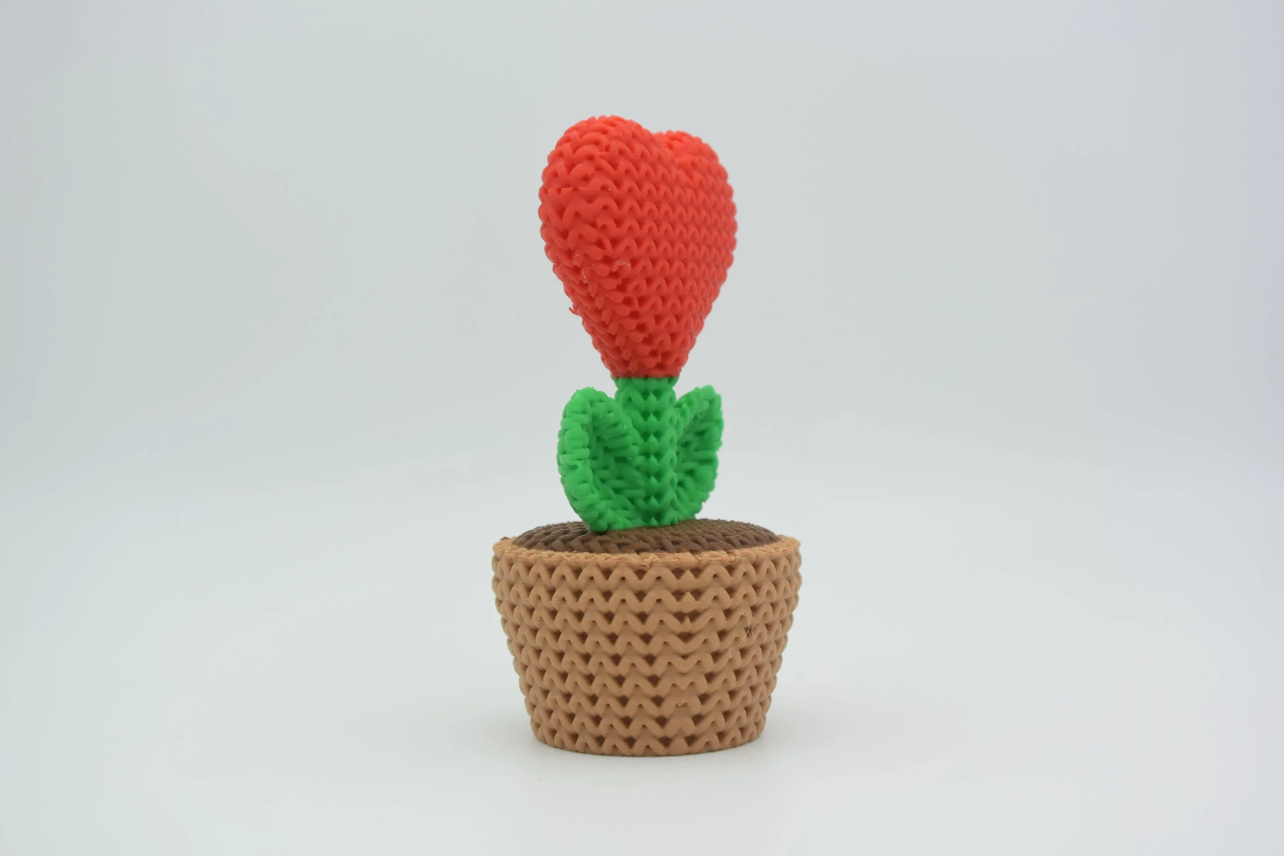 Pot de fleur rose tricot