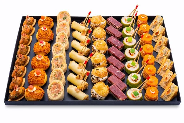 Tray of assorted savory hors d'oeuvres by Curty's, hand-crafted in Paris