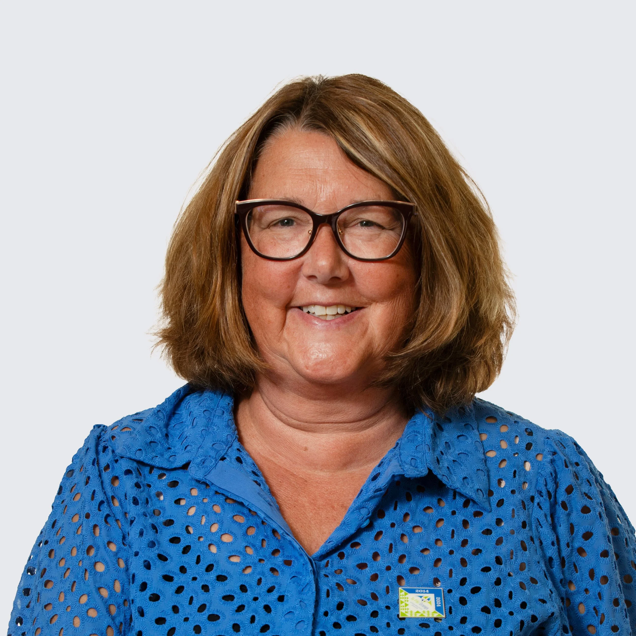 Women with medium length hair and glasses