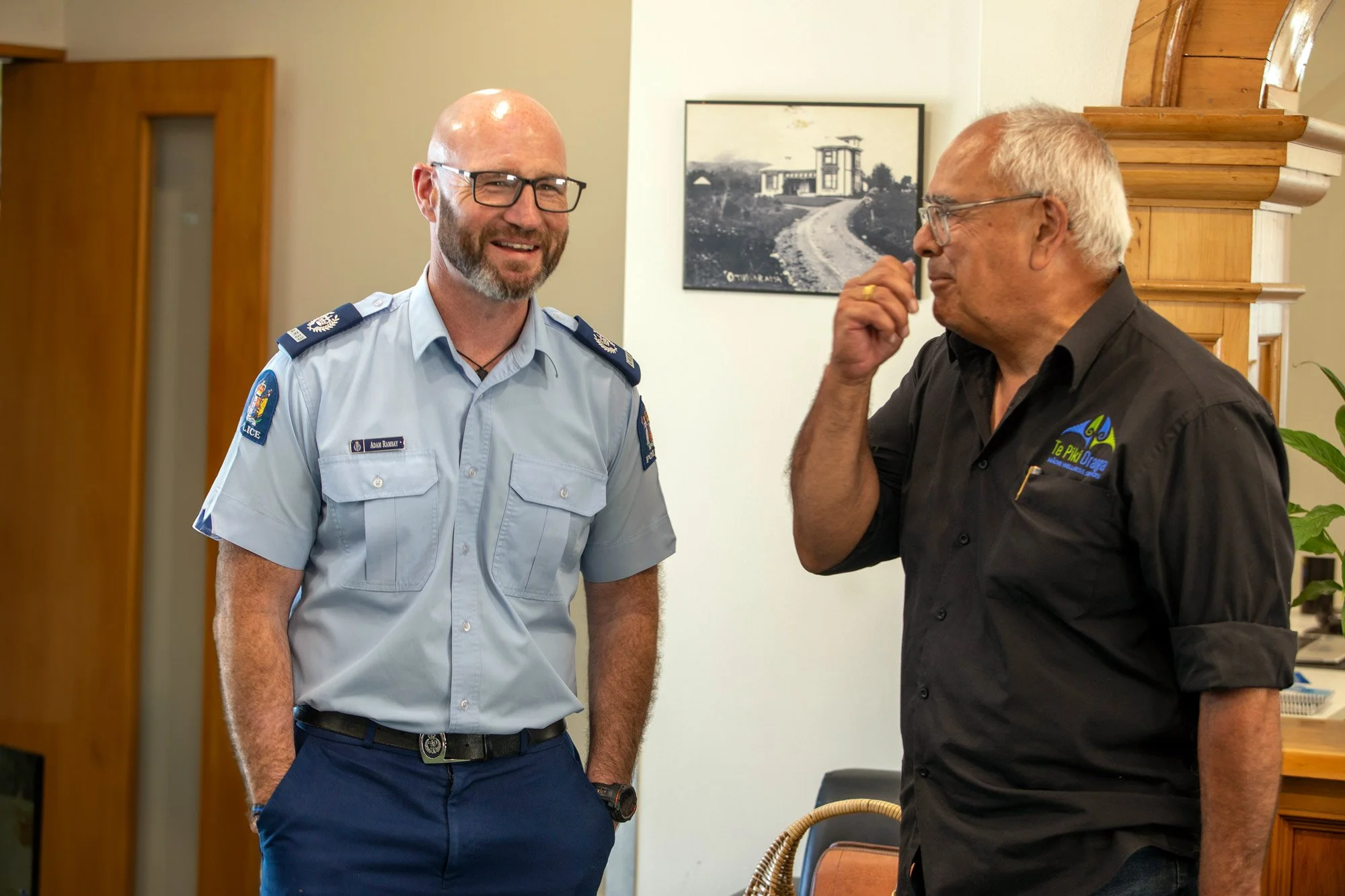 A close-up of two hands shaking, showcasing diversity in skin tones.