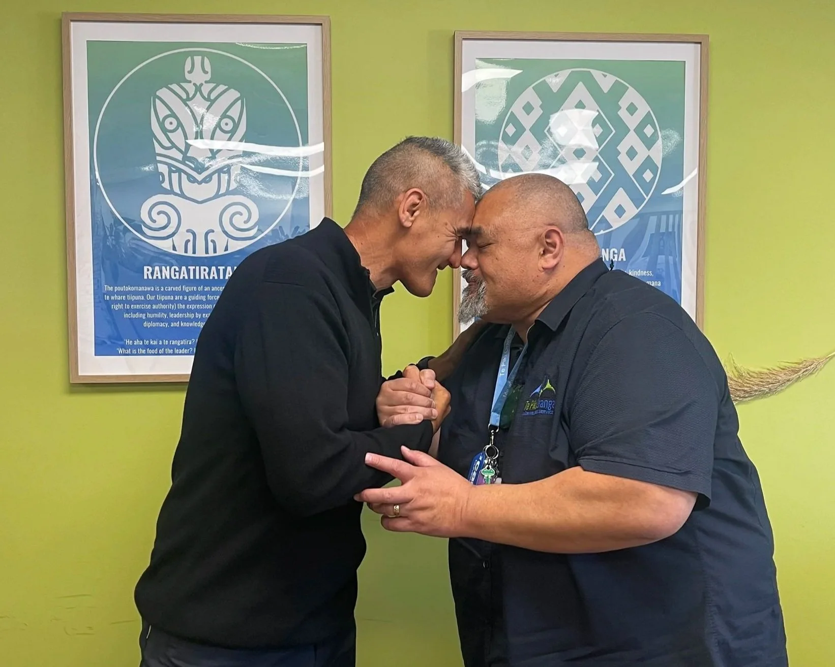 Carl Baker and Emani Soane having a hongi together