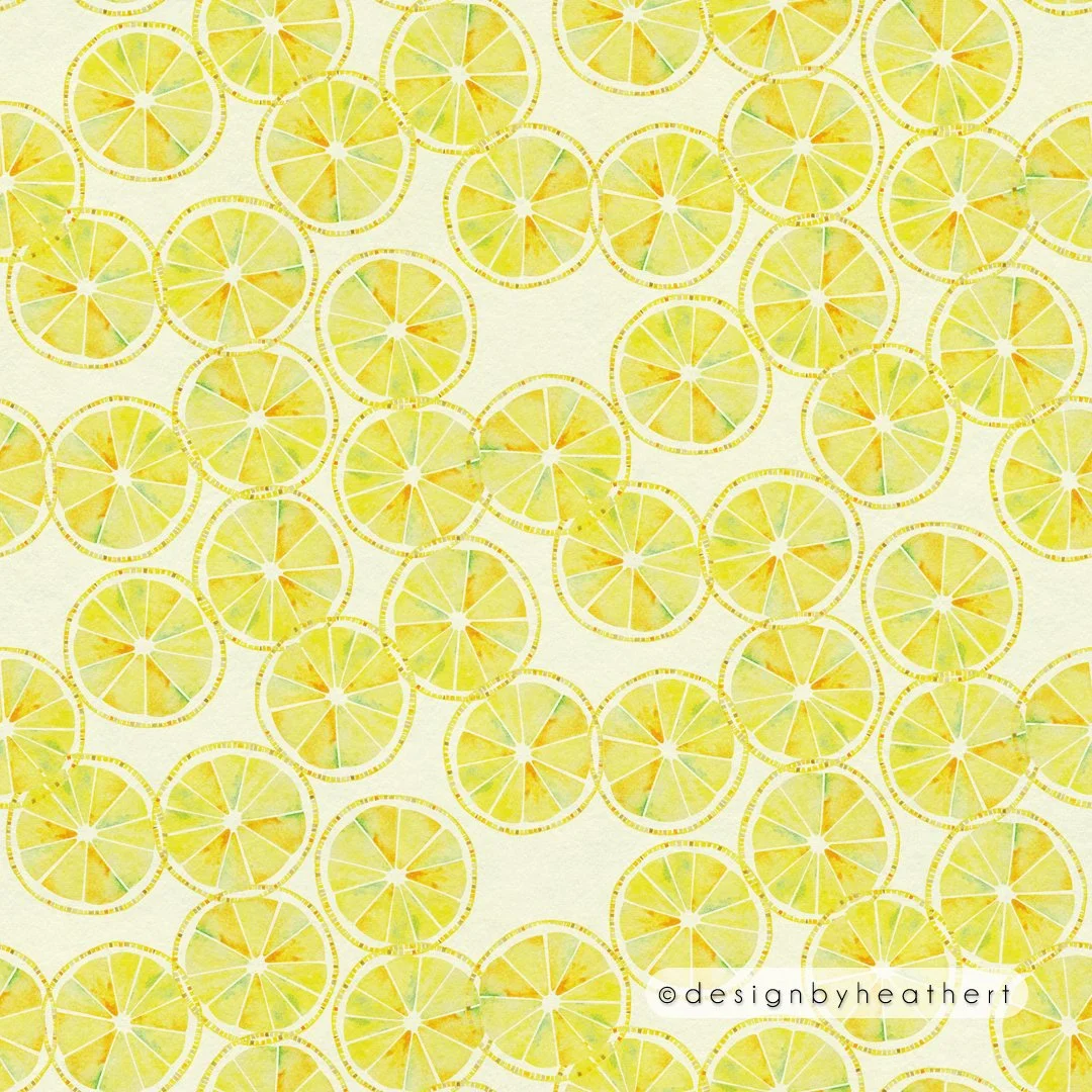 Scattered lemon slices against cream