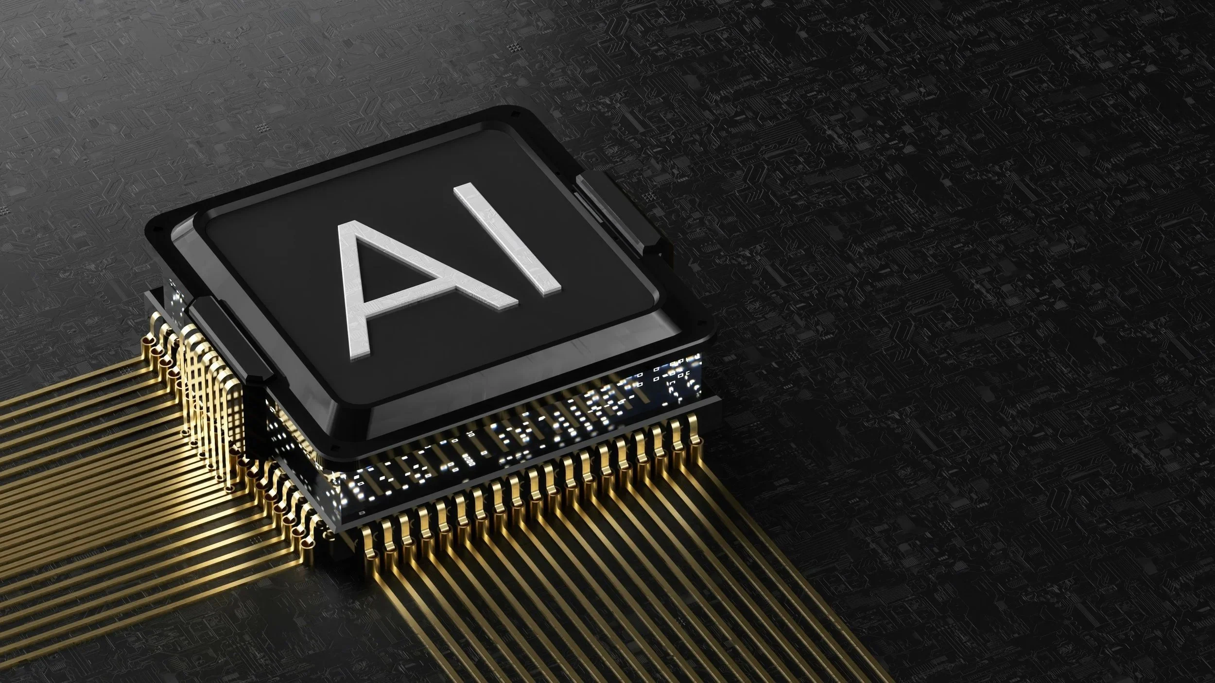 Close-up of a computer chip with the letter 'A' on it, with gold pins extending from the chip onto a circuit board.