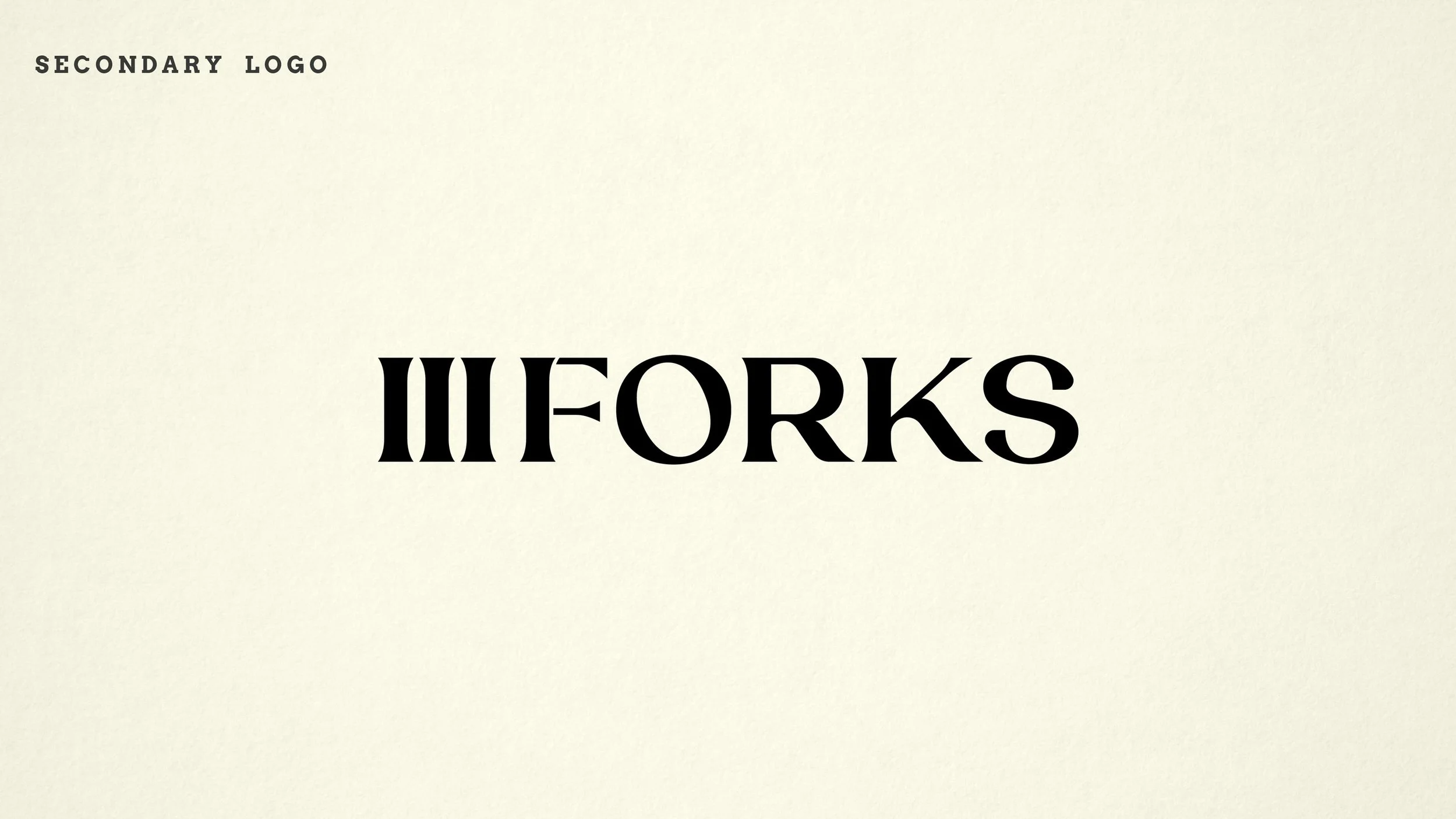 Image with the text 'SECONDARY LOGO' at the top left corner and the word 'FORKS' in bold, black font in the center, with some mirrored or reversed characters.