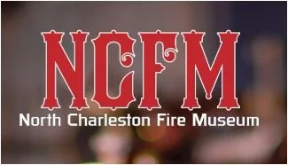 Sign for North Charleston Fire Museum with large red and white letters reading NCFM