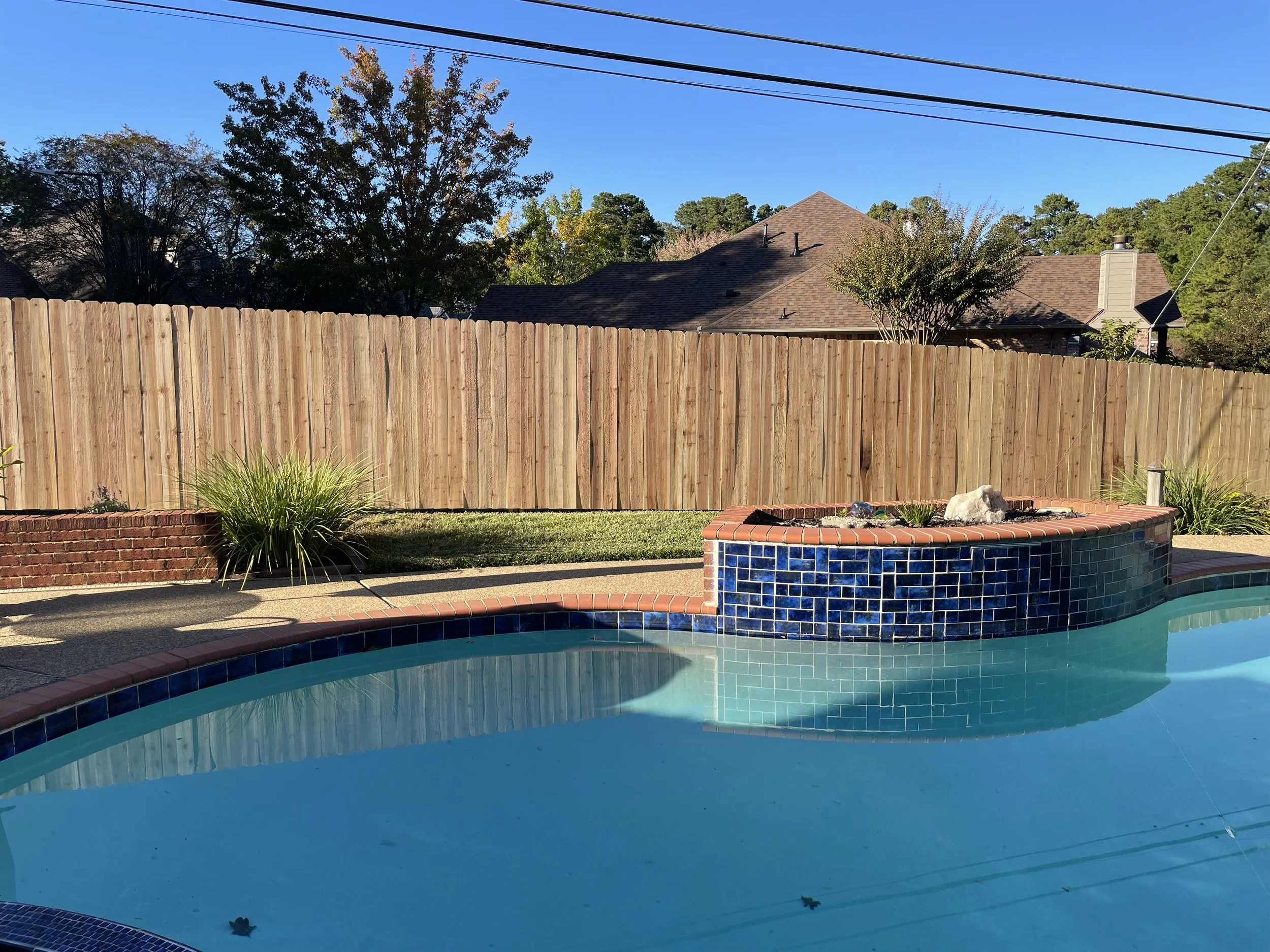 cedar fence around pool.jpg