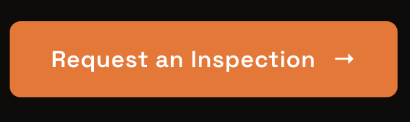 Orange button with white text that reads 'Request an Inspection' and a right-facing arrow.