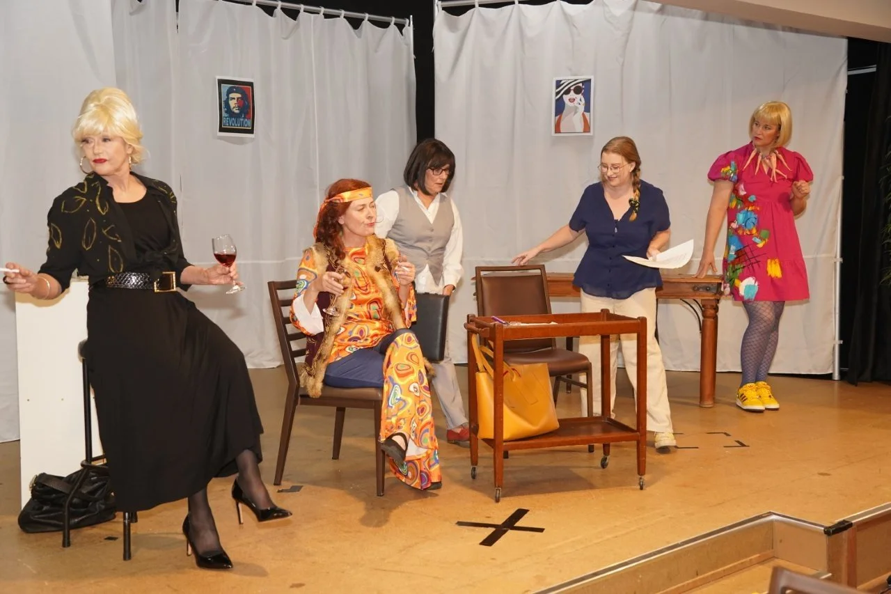 Cowra Theatre Company during rehearsals for 'Absolutely Fabulous' Five women on stage in their costumes