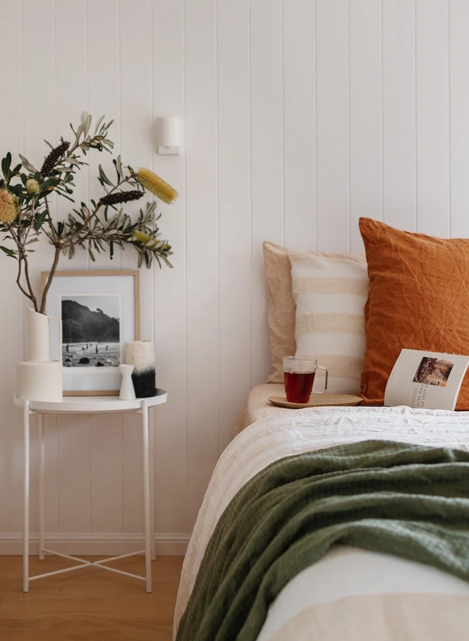 King bed and bedside table with French Flax Linens