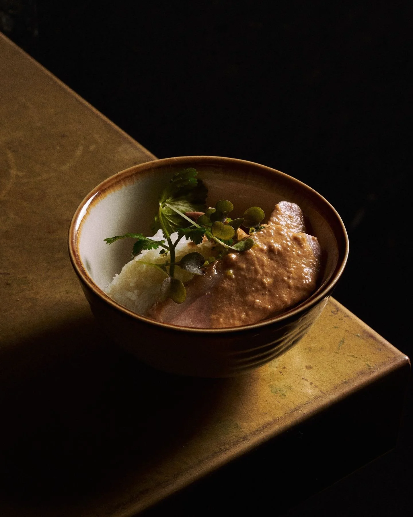 BRAISED DUCK RED CURRY

Tender duck, braised low and slow, bathed in the heat and harmony of red curry. A balance of richness, spice, and quiet elegance.

Served alongside fragrant lemongrass sticky rice, it&rsquo;s a pairing that feels both groundin