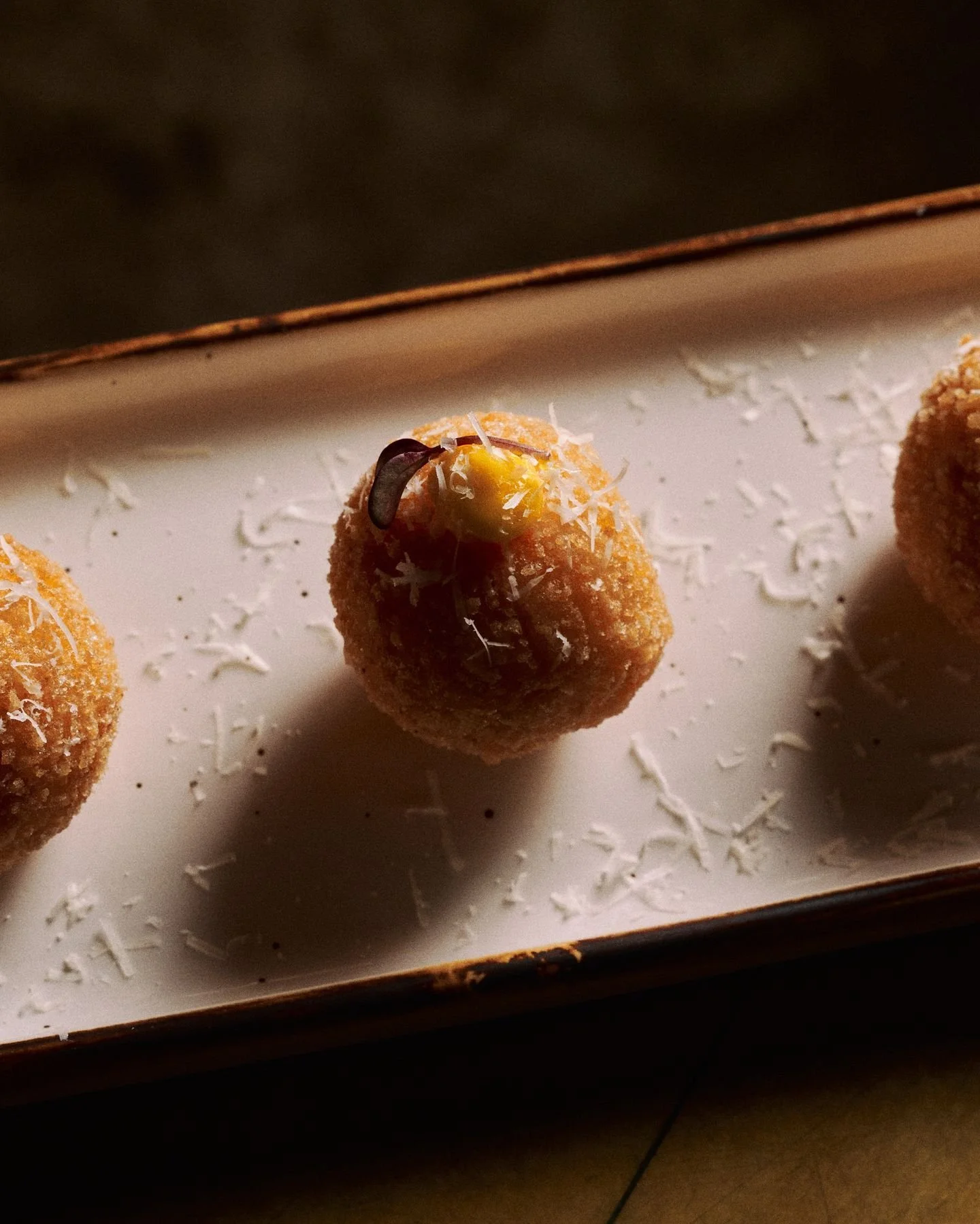 PUMPKIN &amp; PECORINO ARANCINI

Roasted pumpkin, sharp aged pecorino, and a hint of nutmeg, wrapped in creamy risotto and fried to perfection. Finished with a touch of saffron mayo for that extra glow.

Golden, crunchy, and velvety centre. Our pumpk